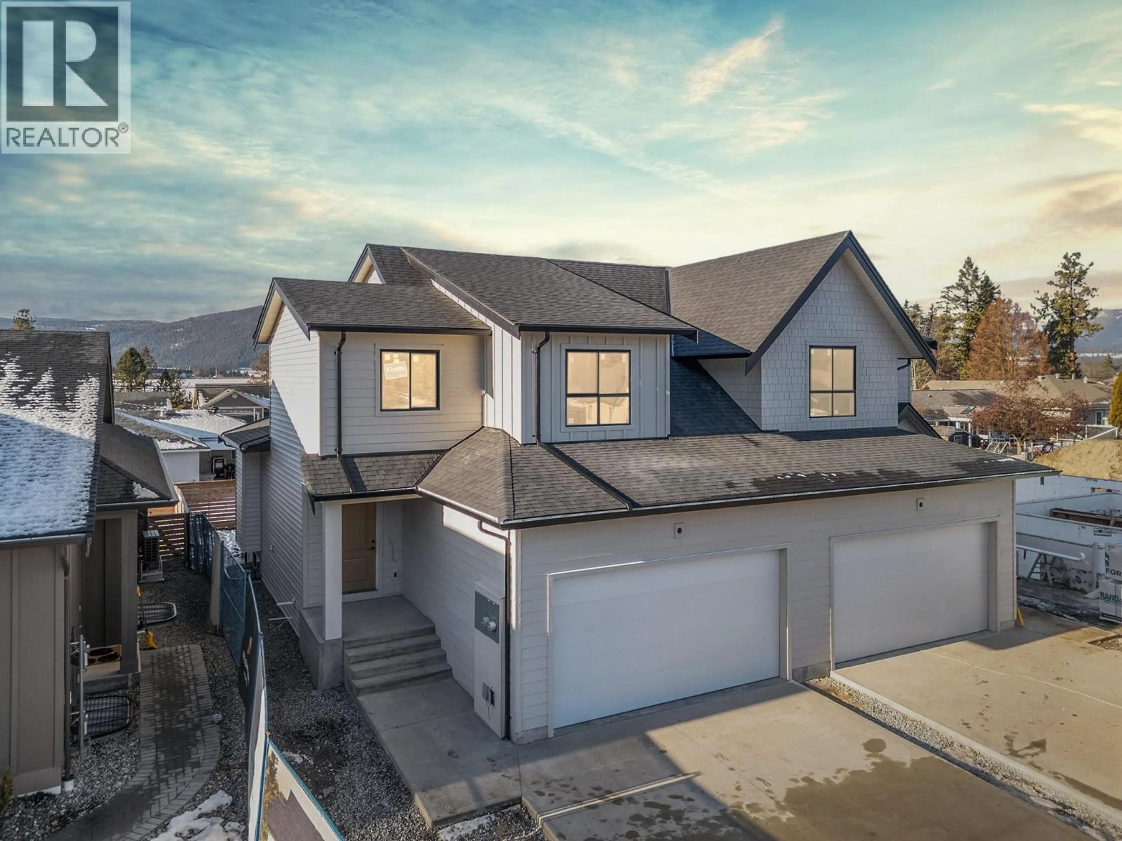 A pic from outside/outdoor area/front of a property/back of a property/a pic from drone, mountain view for 101 - 2455 BRADLEY DRIVE, Armstrong British Columbia V4Y0Y4
