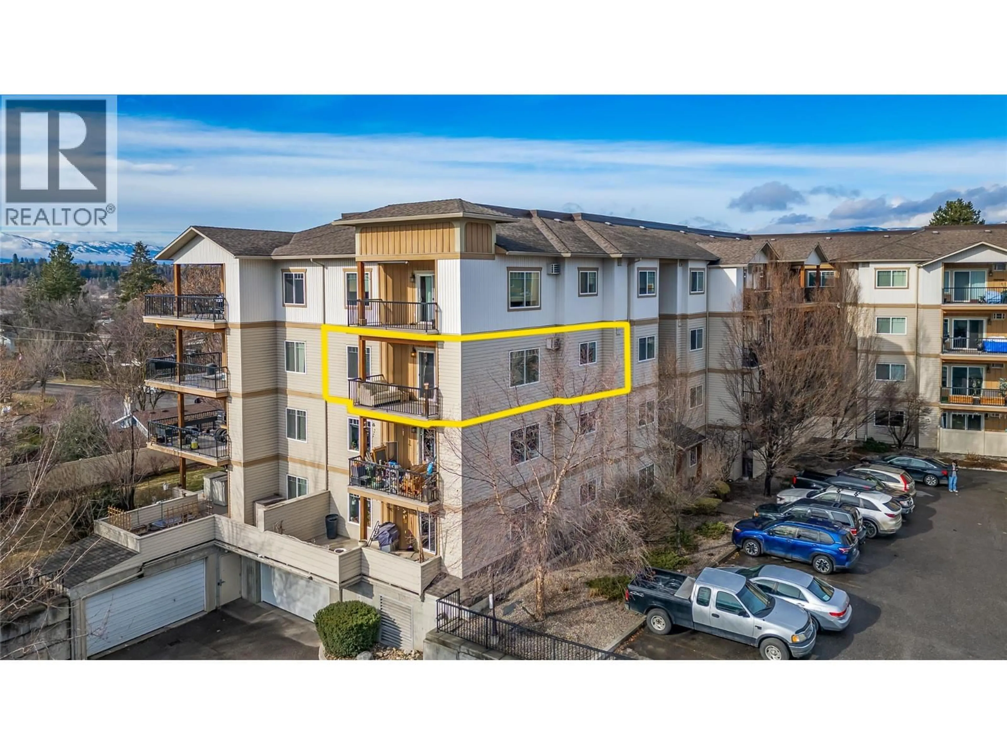 A pic from outside/outdoor area/front of a property/back of a property/a pic from drone, unknown for 302 - 250 HOLLYWOOD ROAD SOUTH, Kelowna British Columbia V1X3S9