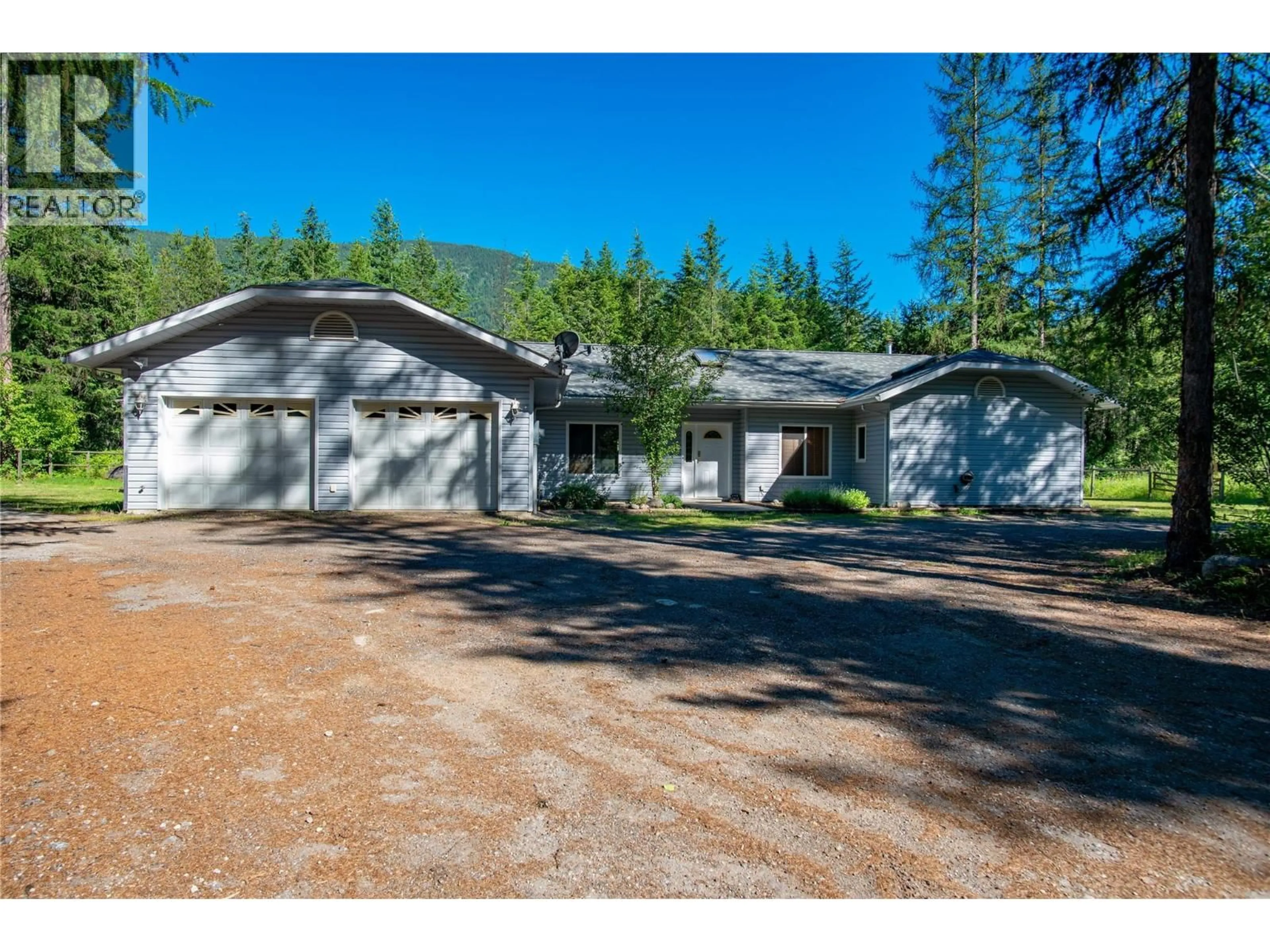 A pic from outside/outdoor area/front of a property/back of a property/a pic from drone, unknown for 2222 JENISA ROAD, Castlegar British Columbia V1N2L8