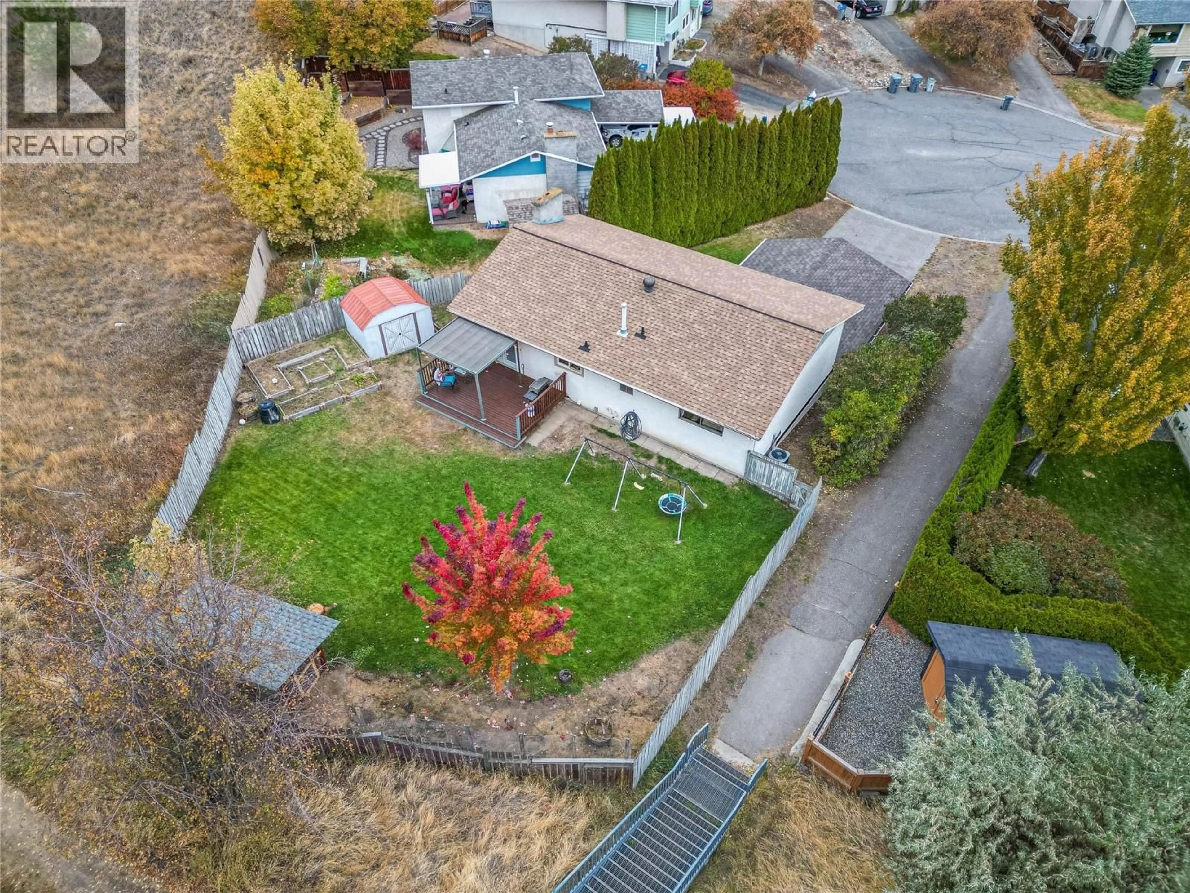 A pic from outside/outdoor area/front of a property/back of a property/a pic from drone, street for 1295 MONASHEE COURT, Kamloops British Columbia V2C6B4