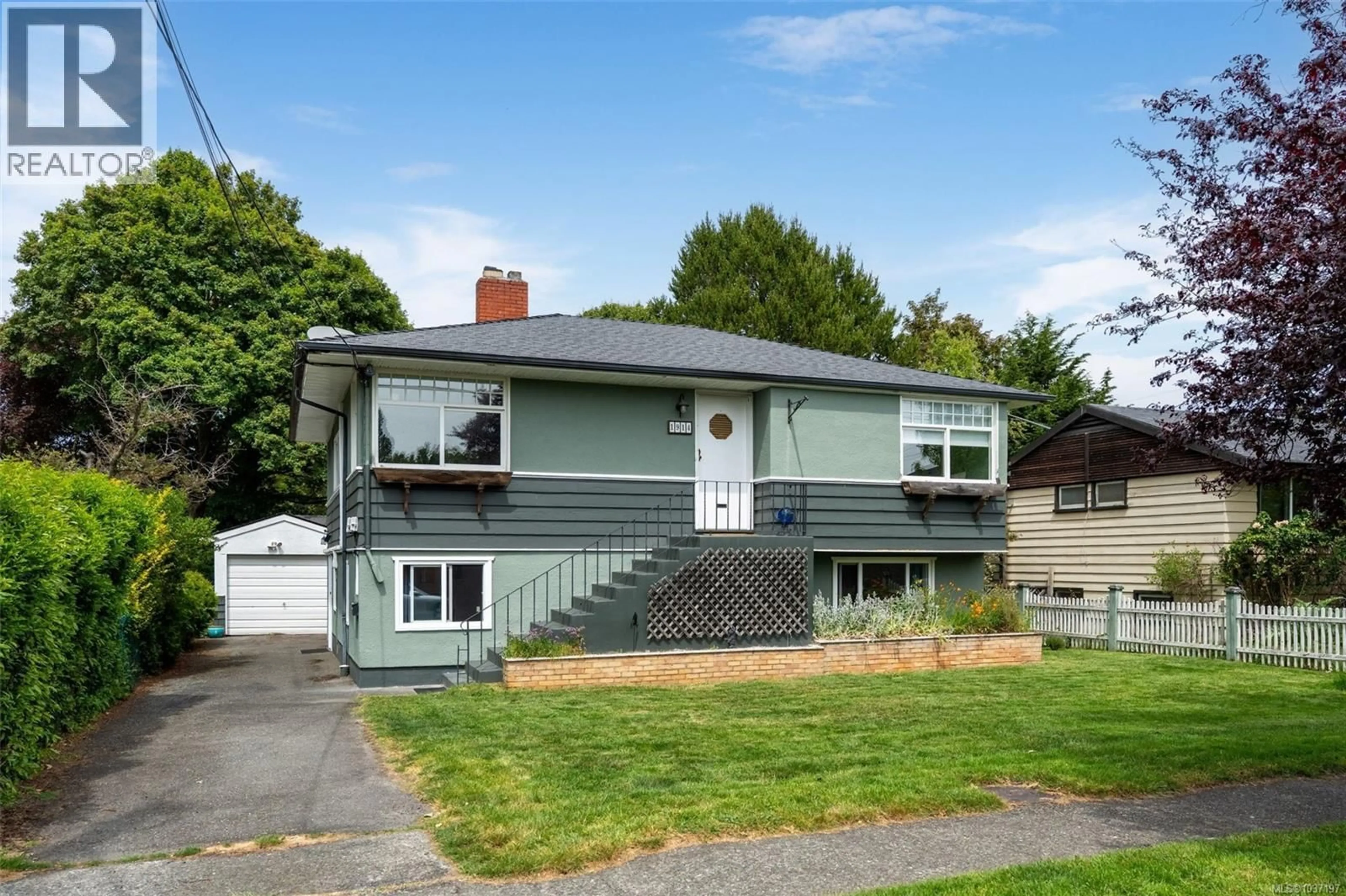 Home with vinyl exterior material, street for 1914 LEIGHTON ROAD, Victoria British Columbia V8R1N4