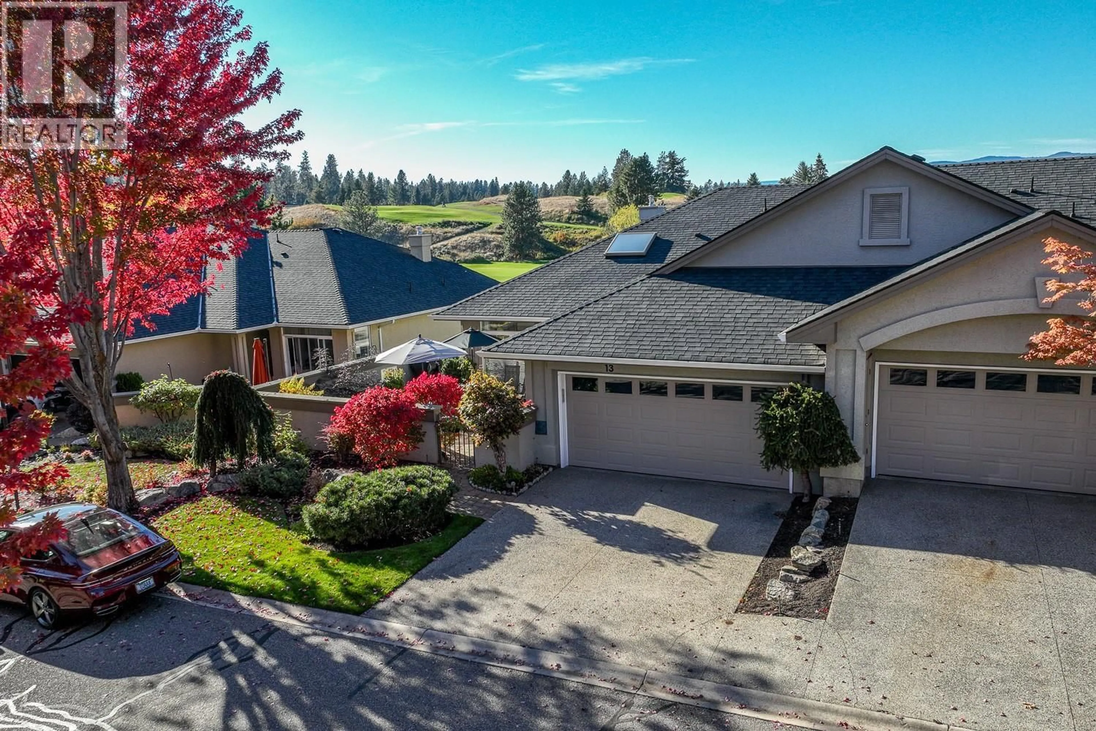 A pic from outside/outdoor area/front of a property/back of a property/a pic from drone, water/lake/river/ocean view for 13 - 3888 GALLAGHERS PINNACLE WAY, Kelowna British Columbia V1W3Z8