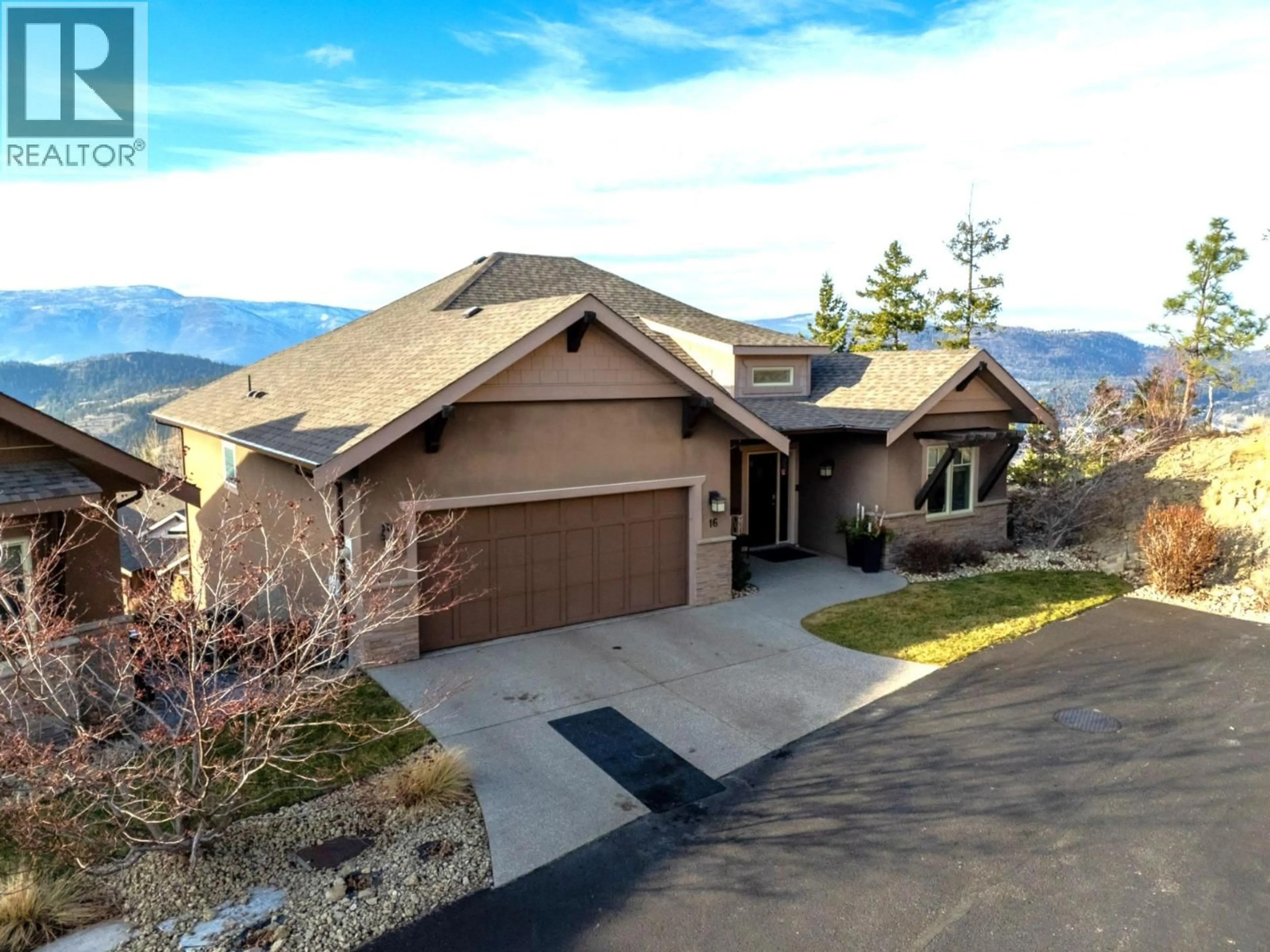 A pic from outside/outdoor area/front of a property/back of a property/a pic from drone, mountain view for 16 - 2450 SELKIRK DRIVE, Kelowna British Columbia V1V2Z5
