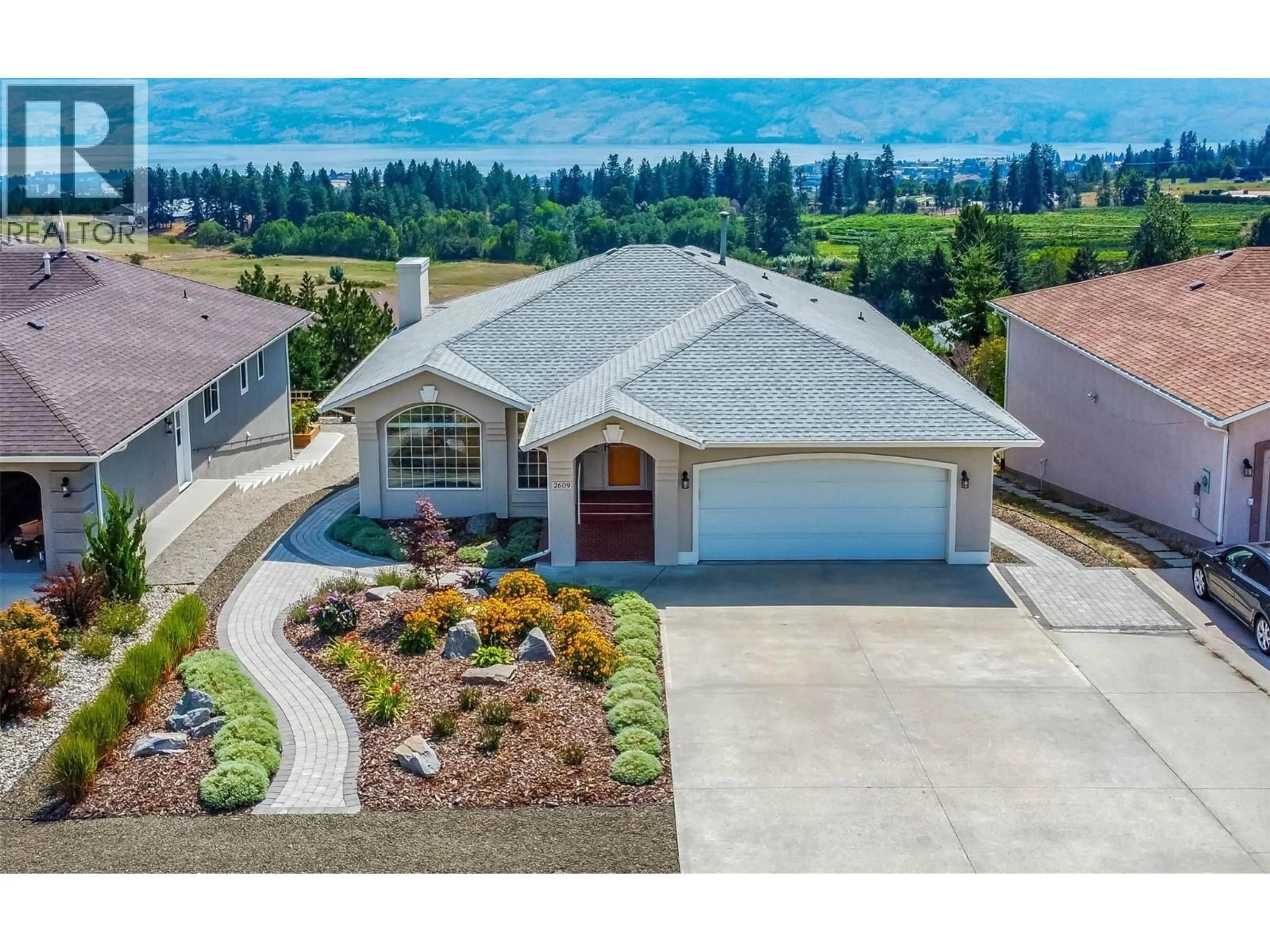A pic from outside/outdoor area/front of a property/back of a property/a pic from drone, unknown for 2609 WILD HORSE DRIVE, West Kelowna British Columbia V4T2K9