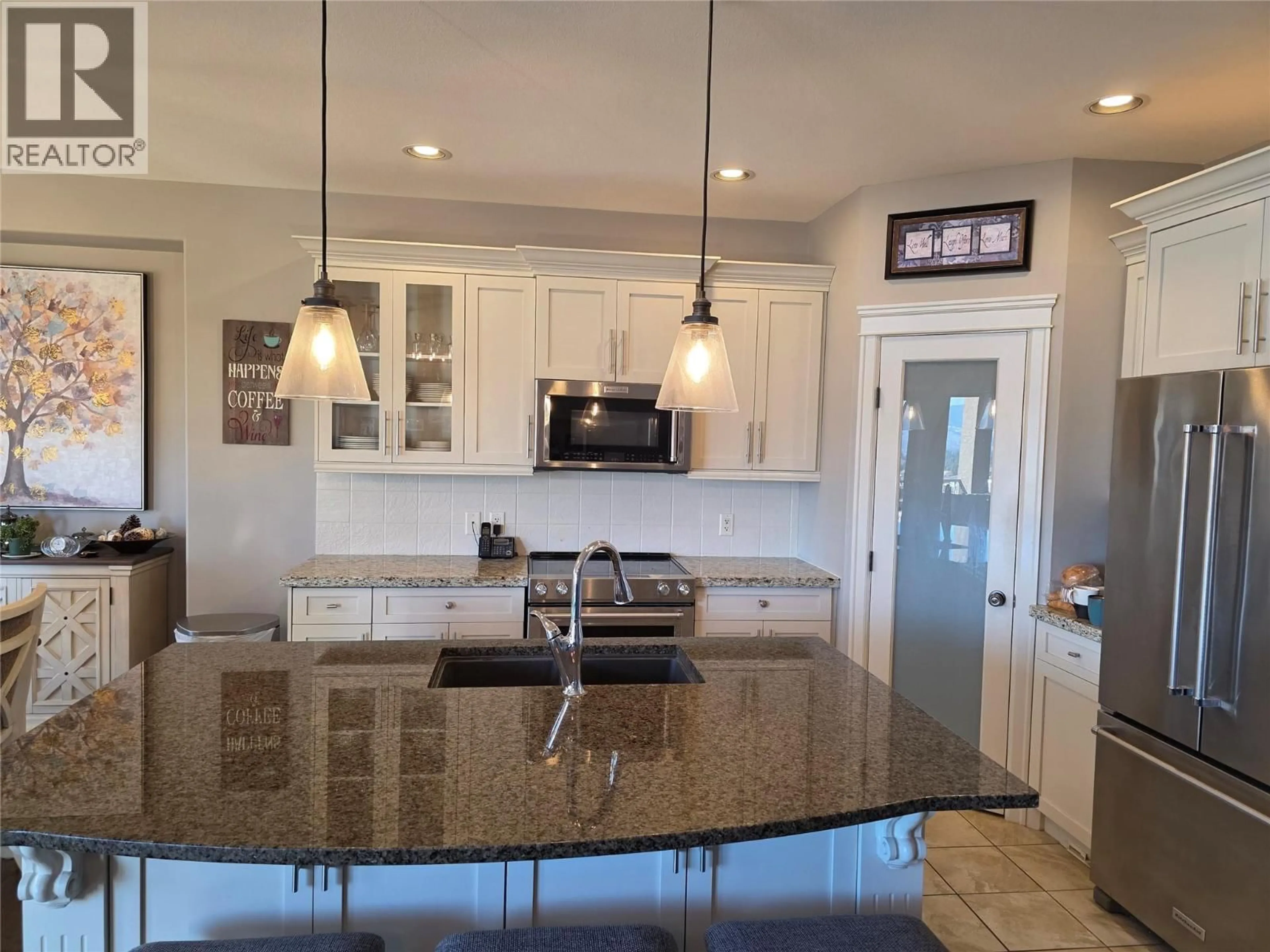 Open concept kitchen, ceramic/tile floor for 1911 CORNERSTONE DRIVE, West Kelowna British Columbia V4T2Y3