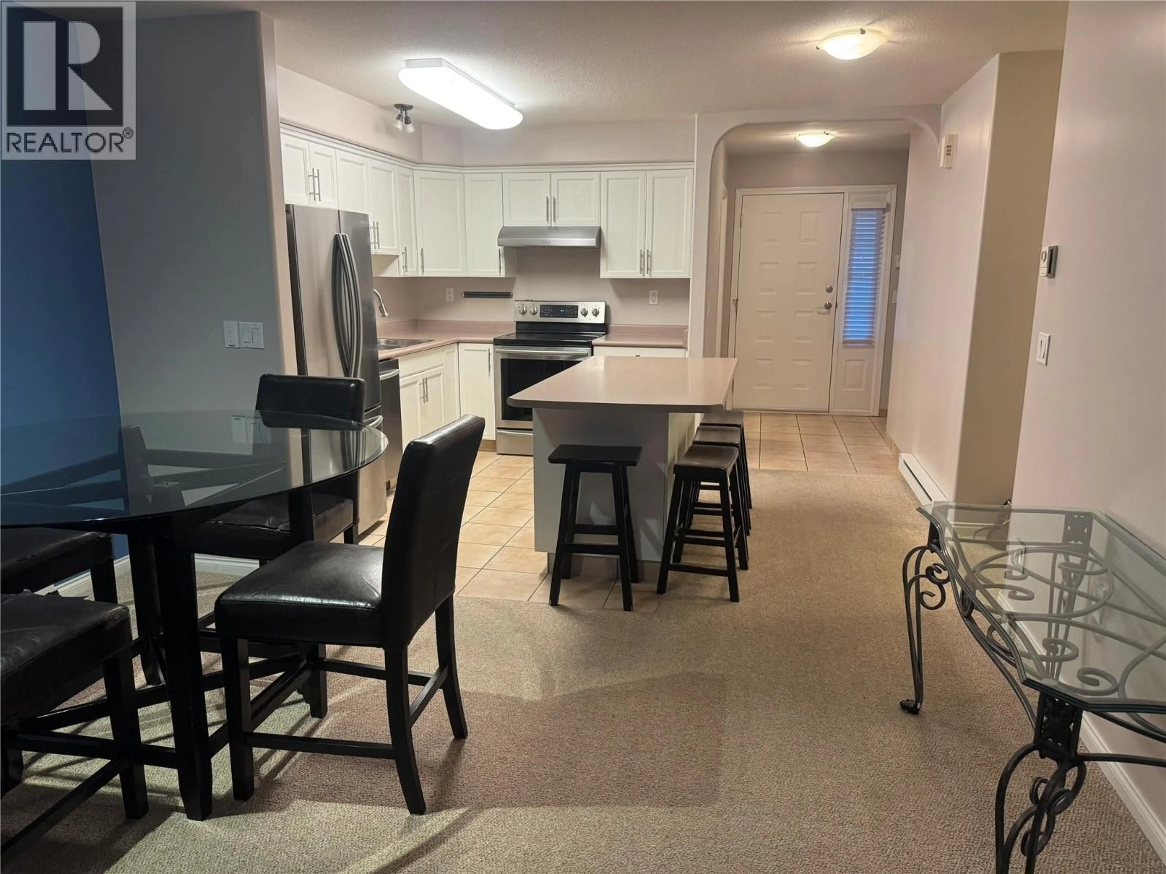 Open concept kitchen, ceramic/tile floor for 302 - 9307 62ND AVENUE, Osoyoos British Columbia V0H1V1