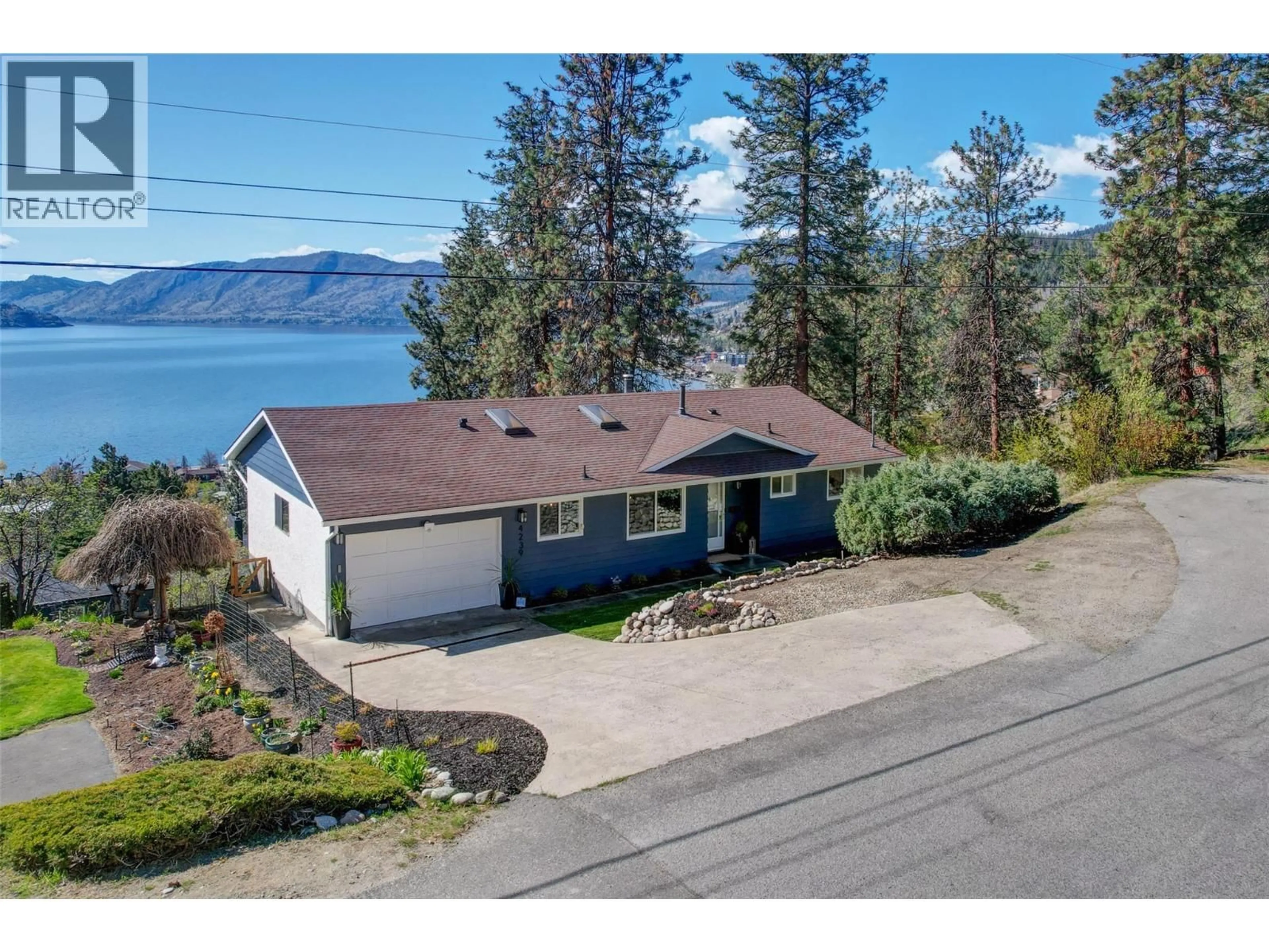 A pic from outside/outdoor area/front of a property/back of a property/a pic from drone, water/lake/river/ocean view for 4239 4TH AVENUE, Peachland British Columbia V0H1X5