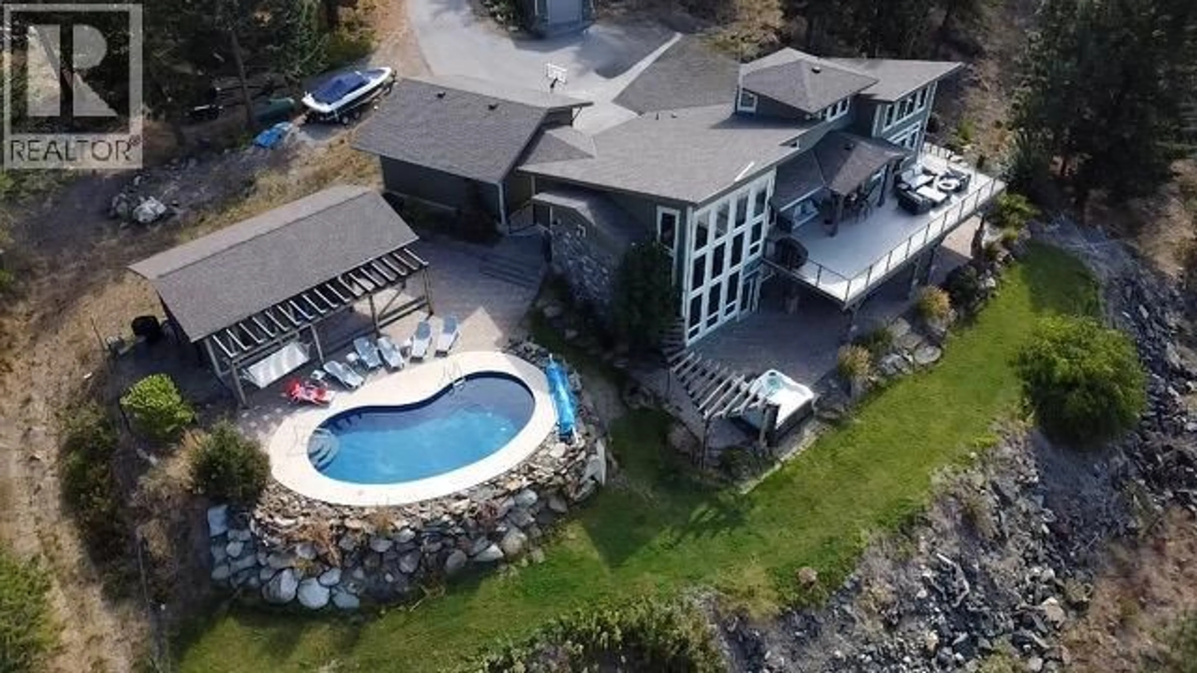 A pic from outside/outdoor area/front of a property/back of a property/a pic from drone, unknown for 1051 BULLMOOSE TRAIL, Osoyoos British Columbia V0H1V6