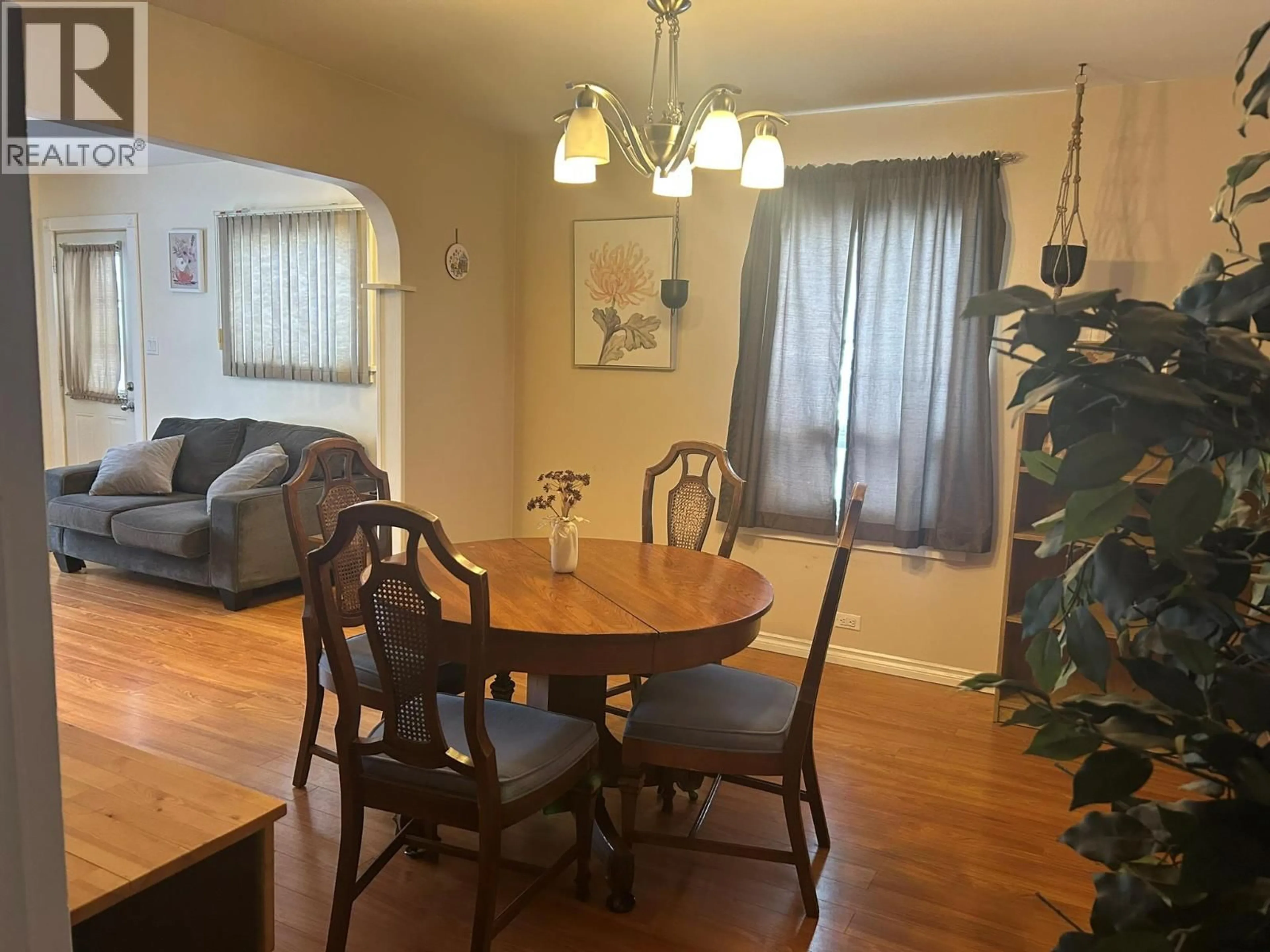 Dining room, wood/laminate floor for 9625 13 STREET, Dawson Creek British Columbia V1G3V9