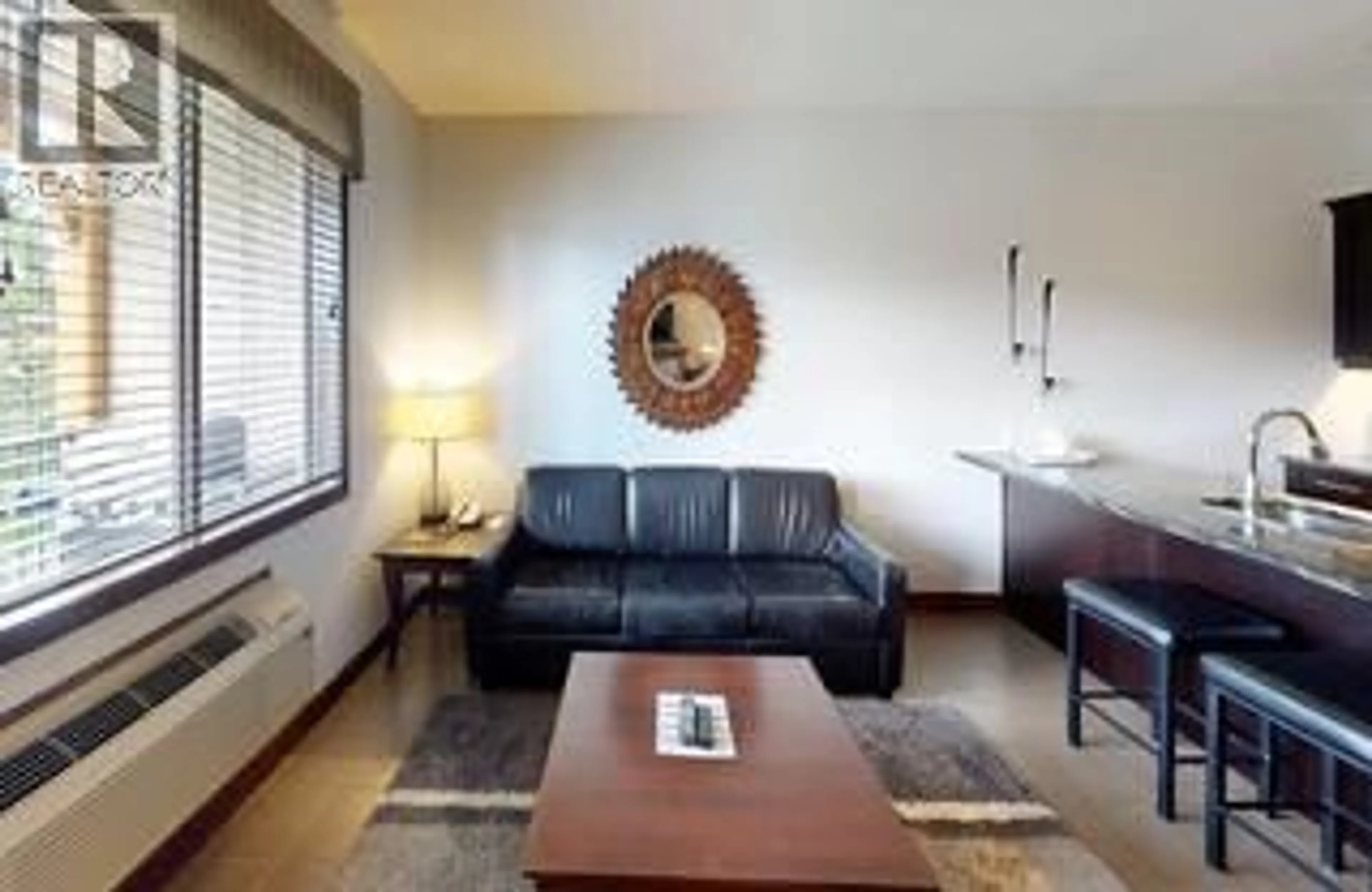 Living room with furniture, wood/laminate floor for 725 I1 - 700 BIGHORN BOULEVARD, Radium Hot Springs British Columbia V0A1M0