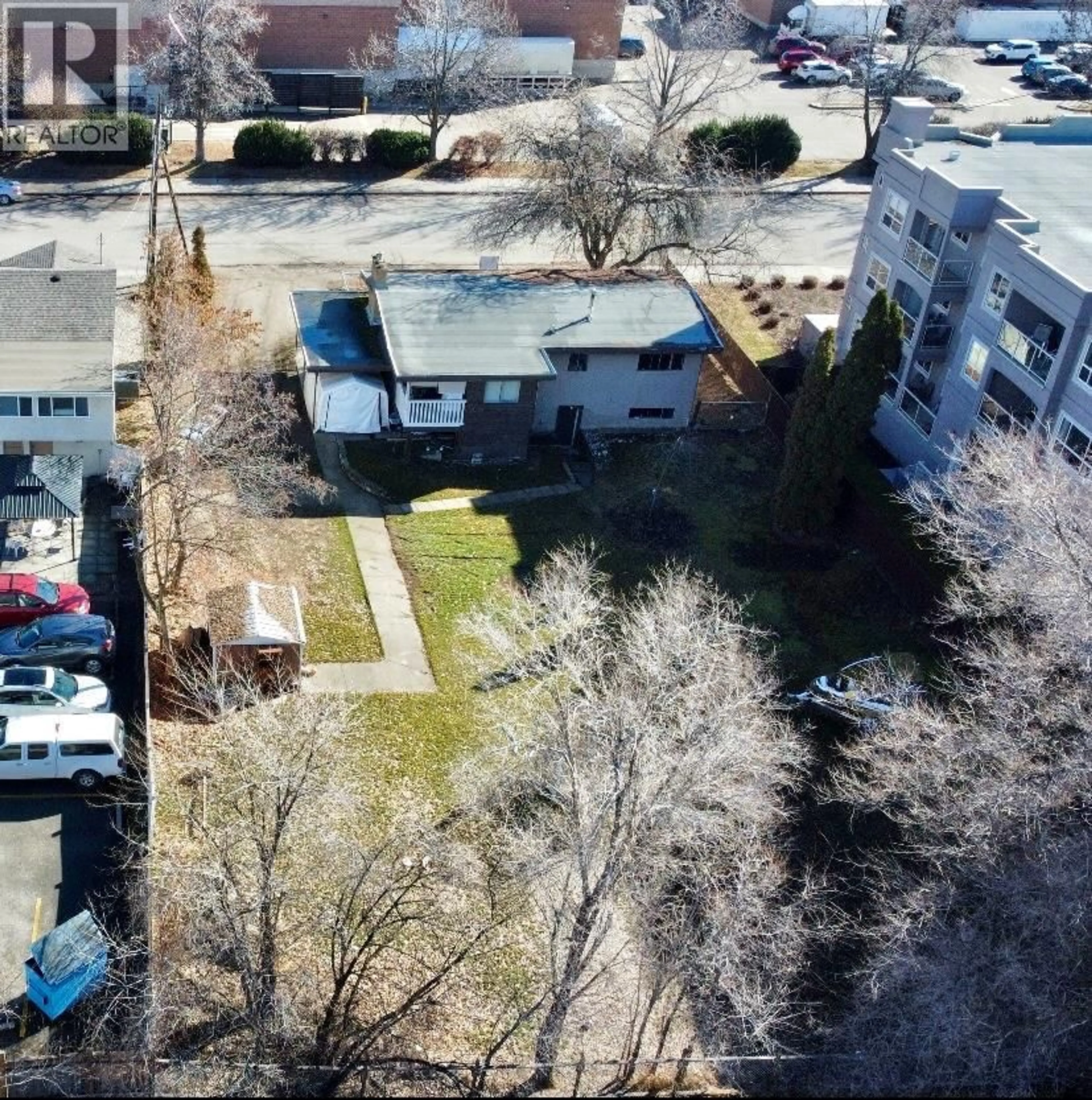 A pic from outside/outdoor area/front of a property/back of a property/a pic from drone, street for 2110 VASILE ROAD, Kelowna British Columbia V1Y6H5