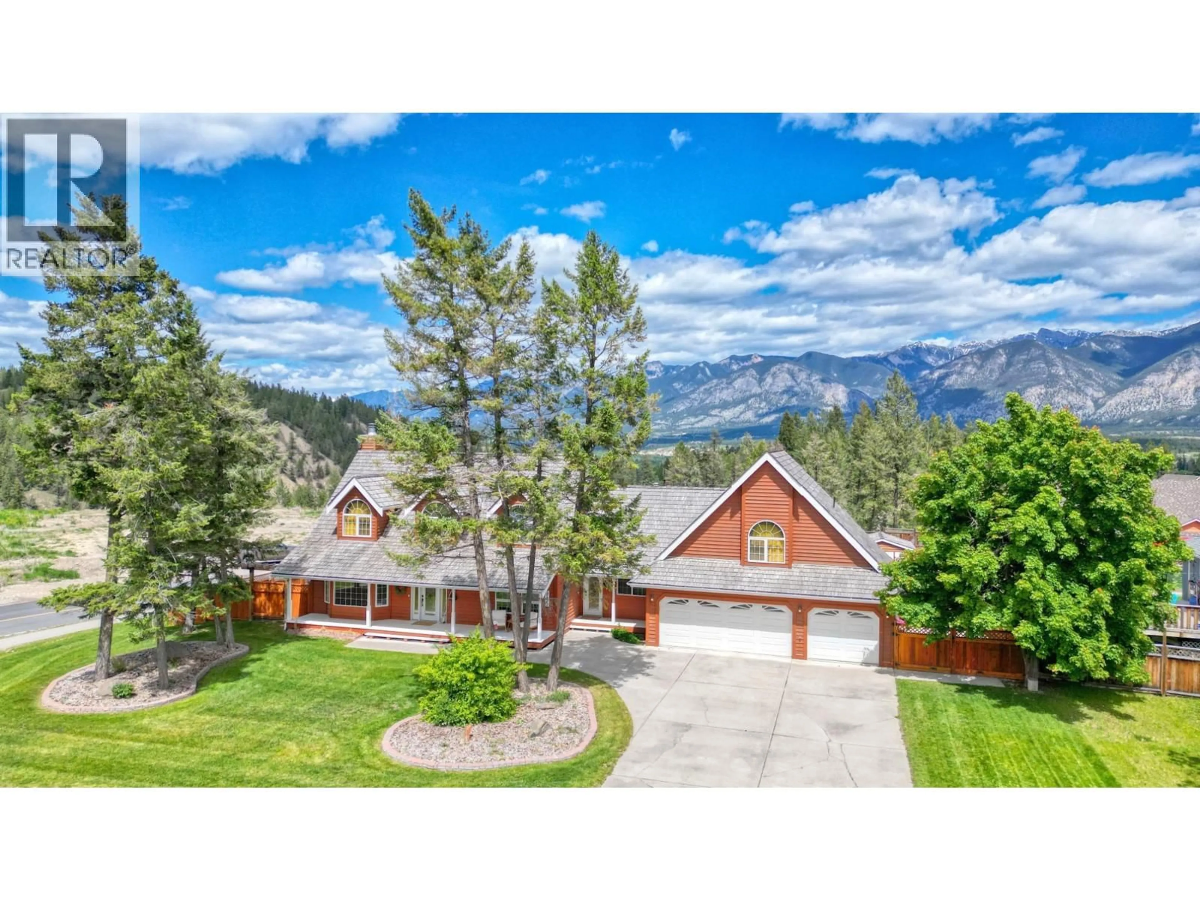 A pic from outside/outdoor area/front of a property/back of a property/a pic from drone, mountain view for 945 WESTRIDGE WAY, Invermere British Columbia V0A1K0
