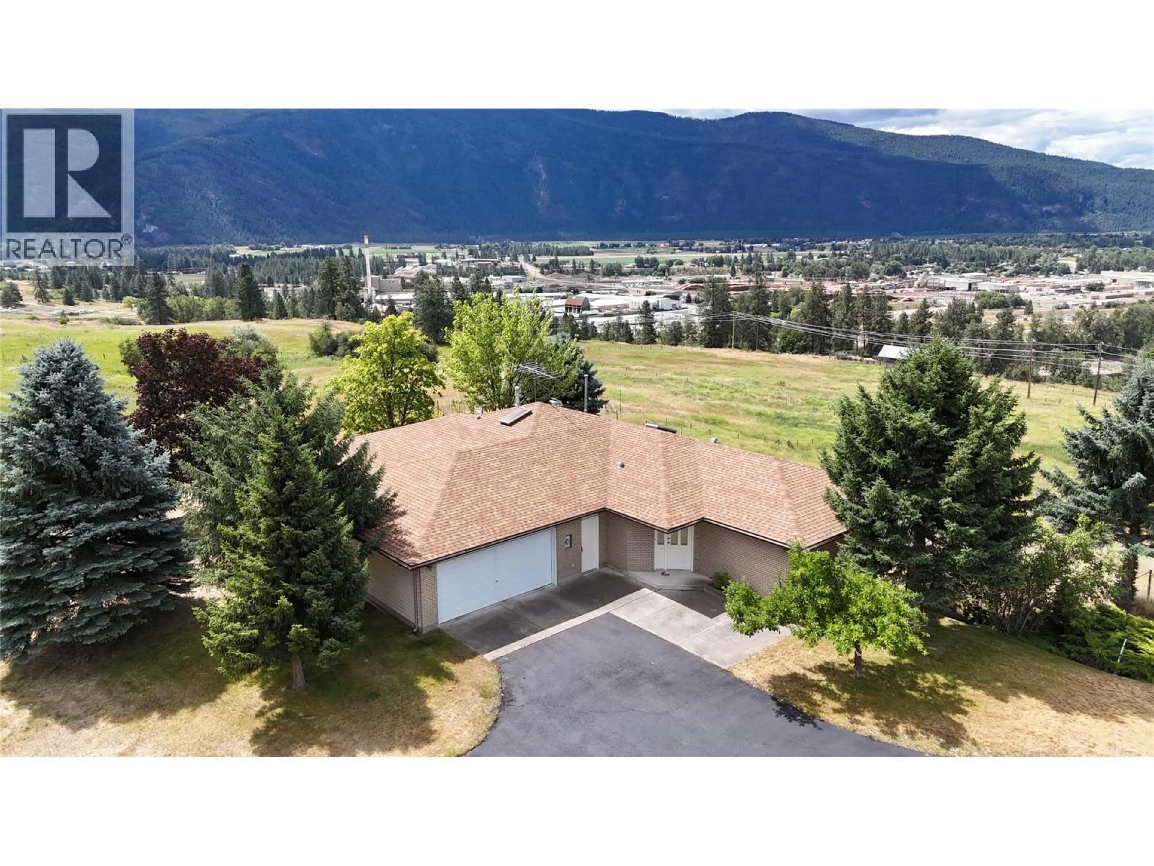 A pic from outside/outdoor area/front of a property/back of a property/a pic from drone, mountain view for 210 WINNIPEG AVENUE, Grand Forks British Columbia V0H1H0