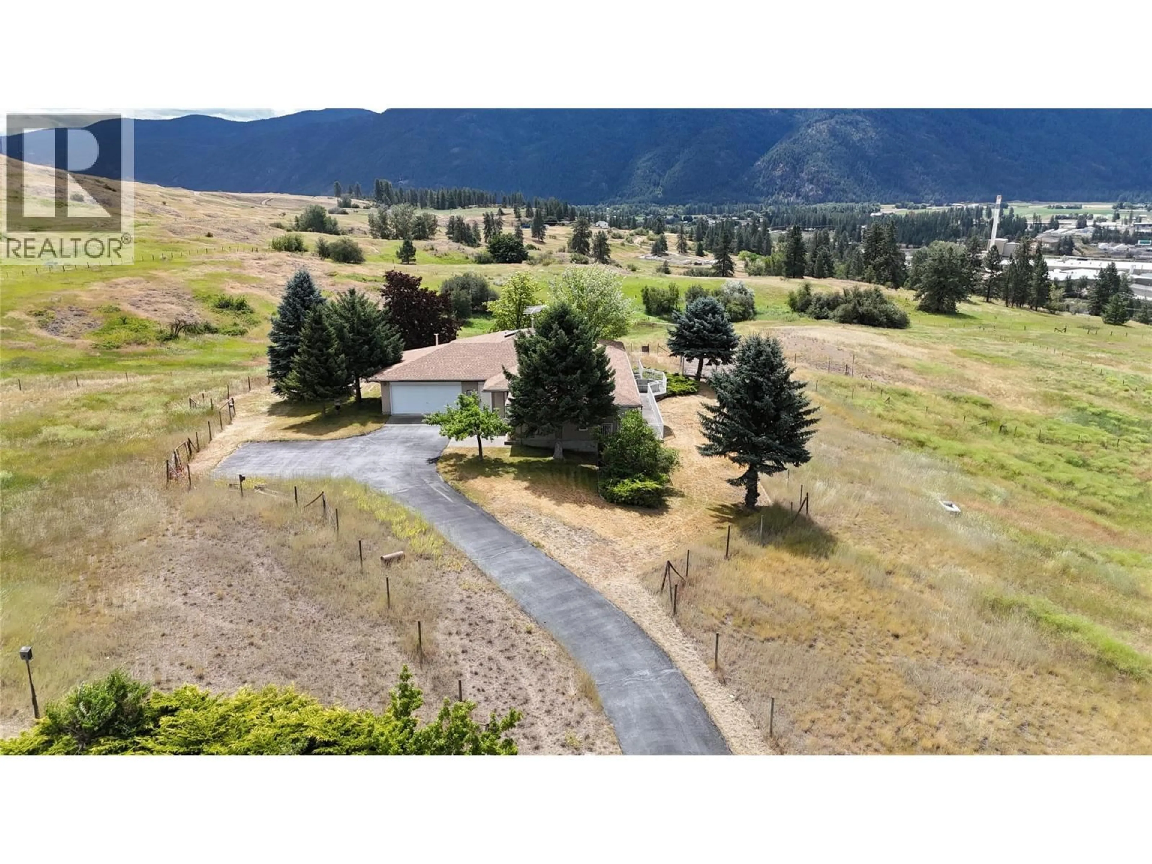 A pic from outside/outdoor area/front of a property/back of a property/a pic from drone, mountain view for 210 WINNIPEG AVENUE, Grand Forks British Columbia V0H1H0