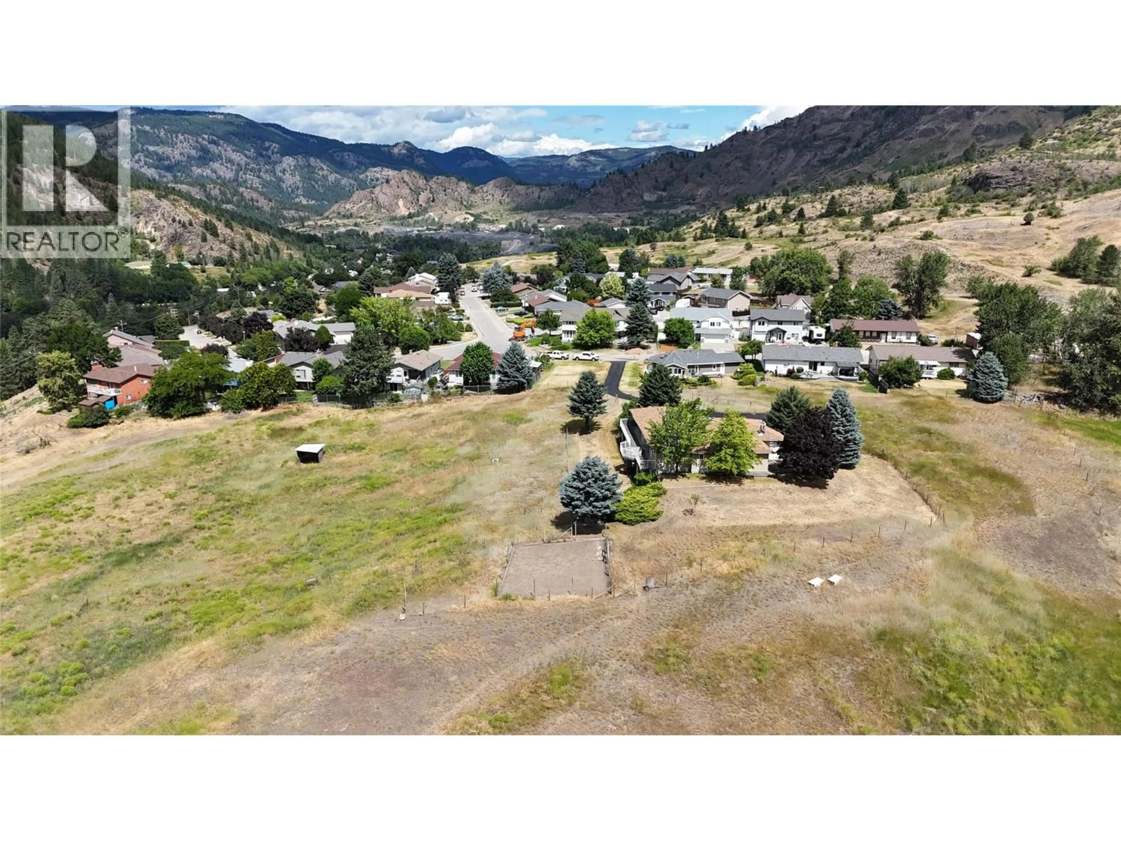A pic from outside/outdoor area/front of a property/back of a property/a pic from drone, mountain view for 210 WINNIPEG AVENUE, Grand Forks British Columbia V0H1H0