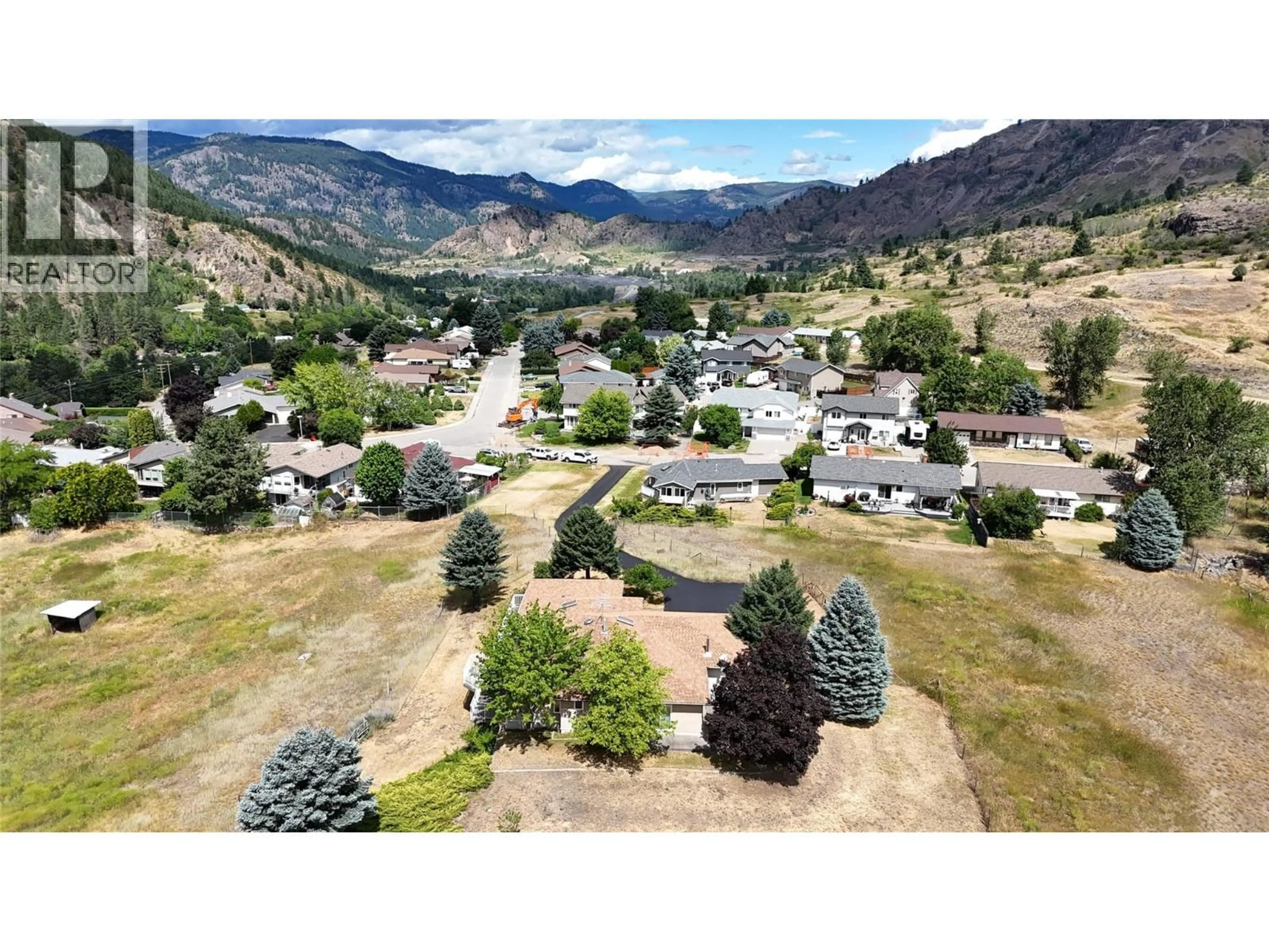 A pic from outside/outdoor area/front of a property/back of a property/a pic from drone, mountain view for 210 WINNIPEG AVENUE, Grand Forks British Columbia V0H1H0