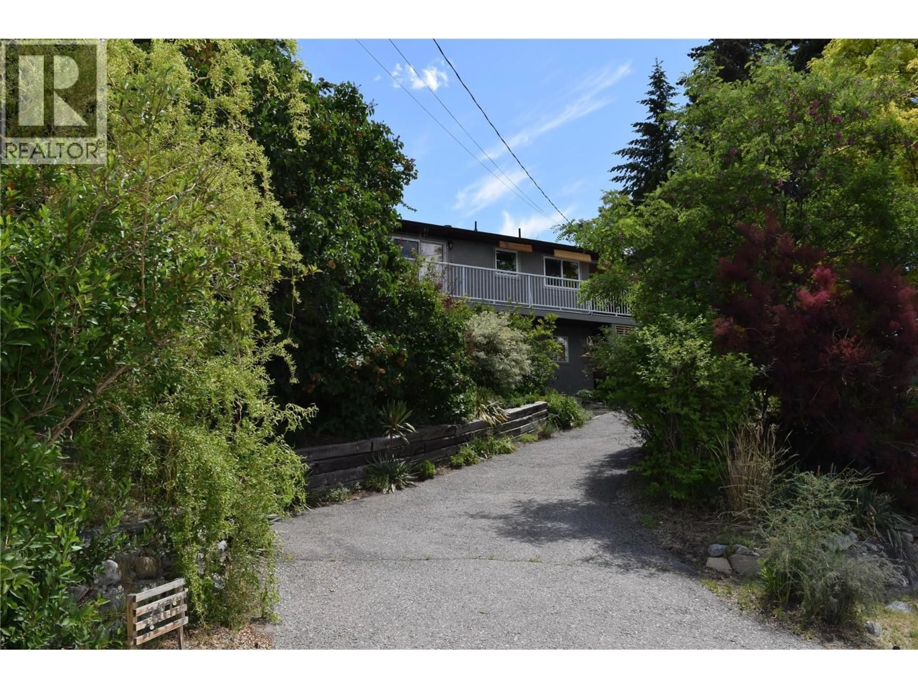 A pic from outside/outdoor area/front of a property/back of a property/a pic from drone, street for 3812 ALBRECHT ROAD, Naramata British Columbia V0H1N1
