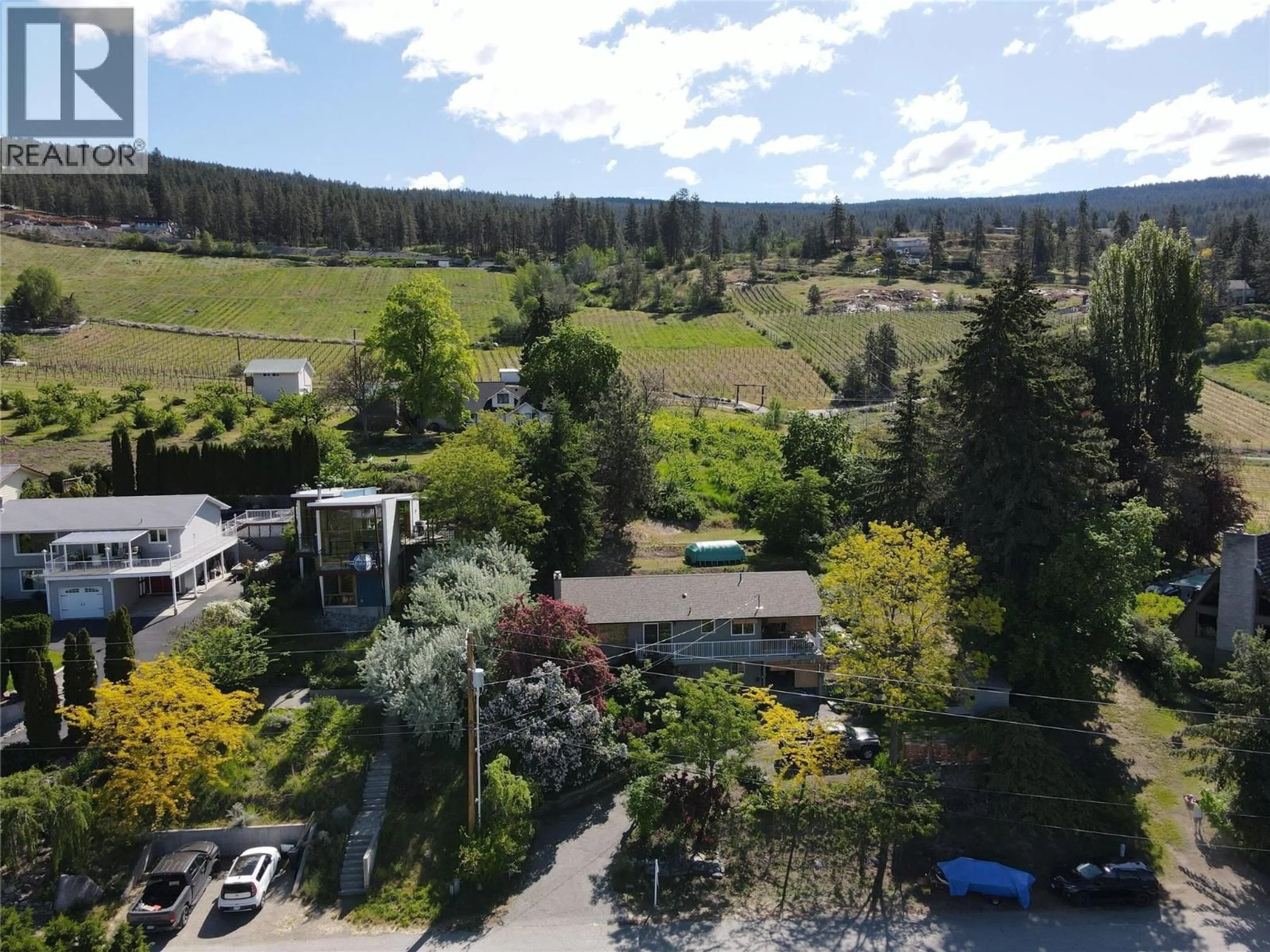 A pic from outside/outdoor area/front of a property/back of a property/a pic from drone, mountain view for 3812 ALBRECHT ROAD, Naramata British Columbia V0H1N1