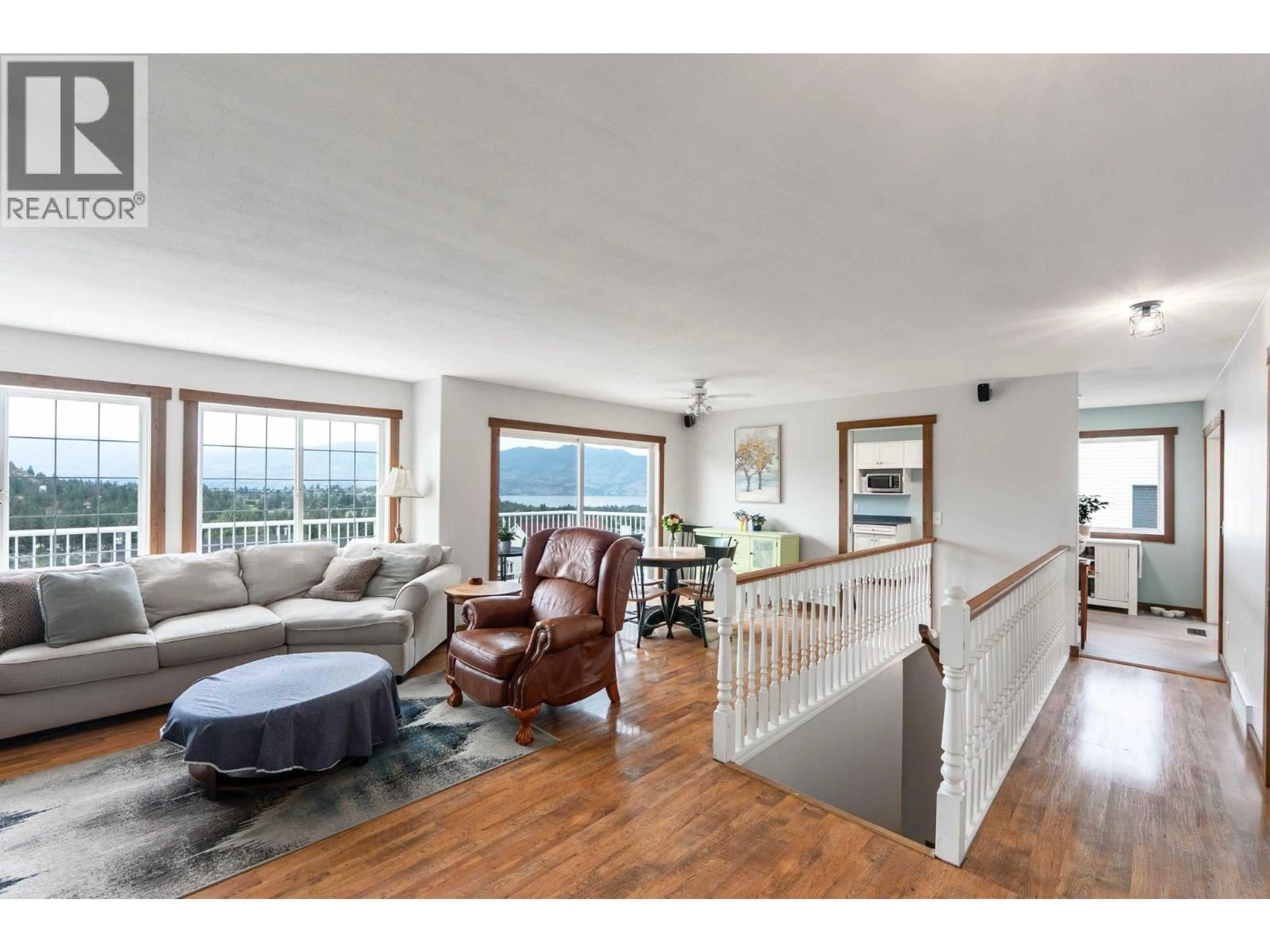 Living room with furniture, wood/laminate floor for 3052 ENSIGN WAY, West Kelowna British Columbia V4T1V1