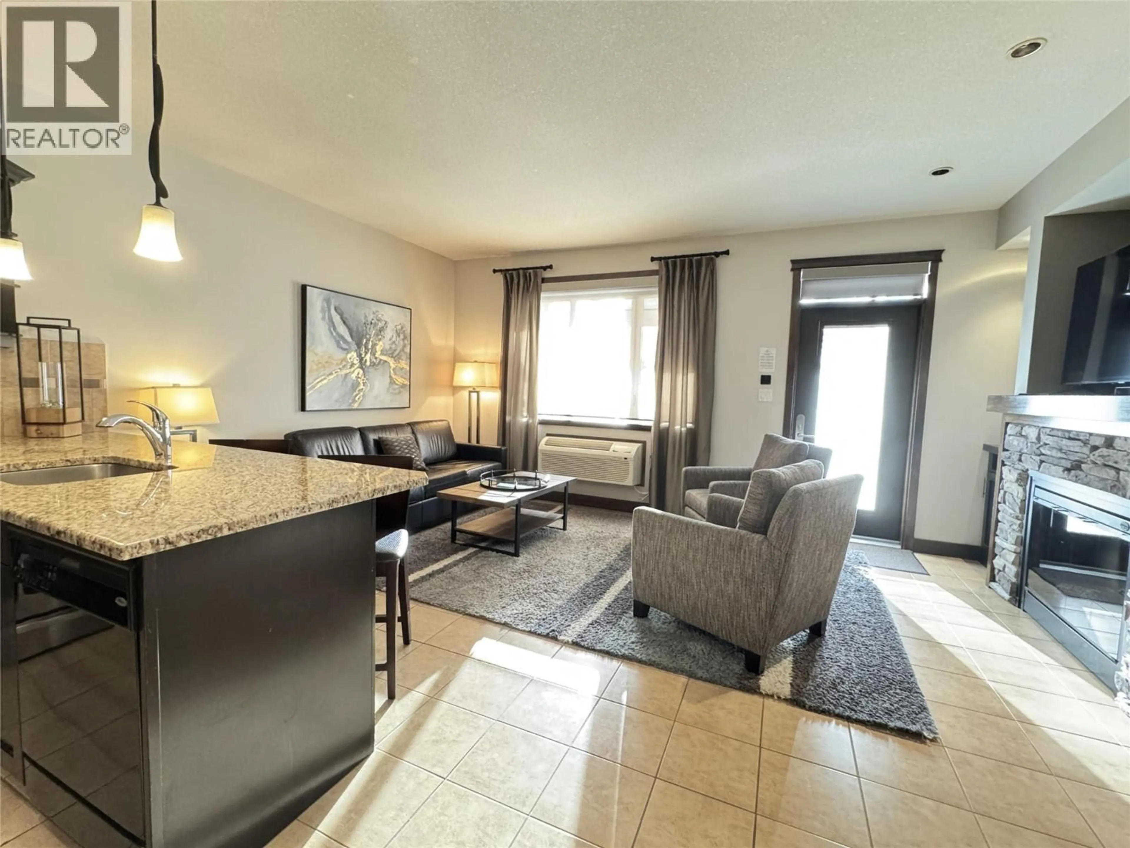 Living room with furniture, unknown for 812F - 800 BIGHORN BOULEVARD, Radium Hot Springs British Columbia V0A1M0