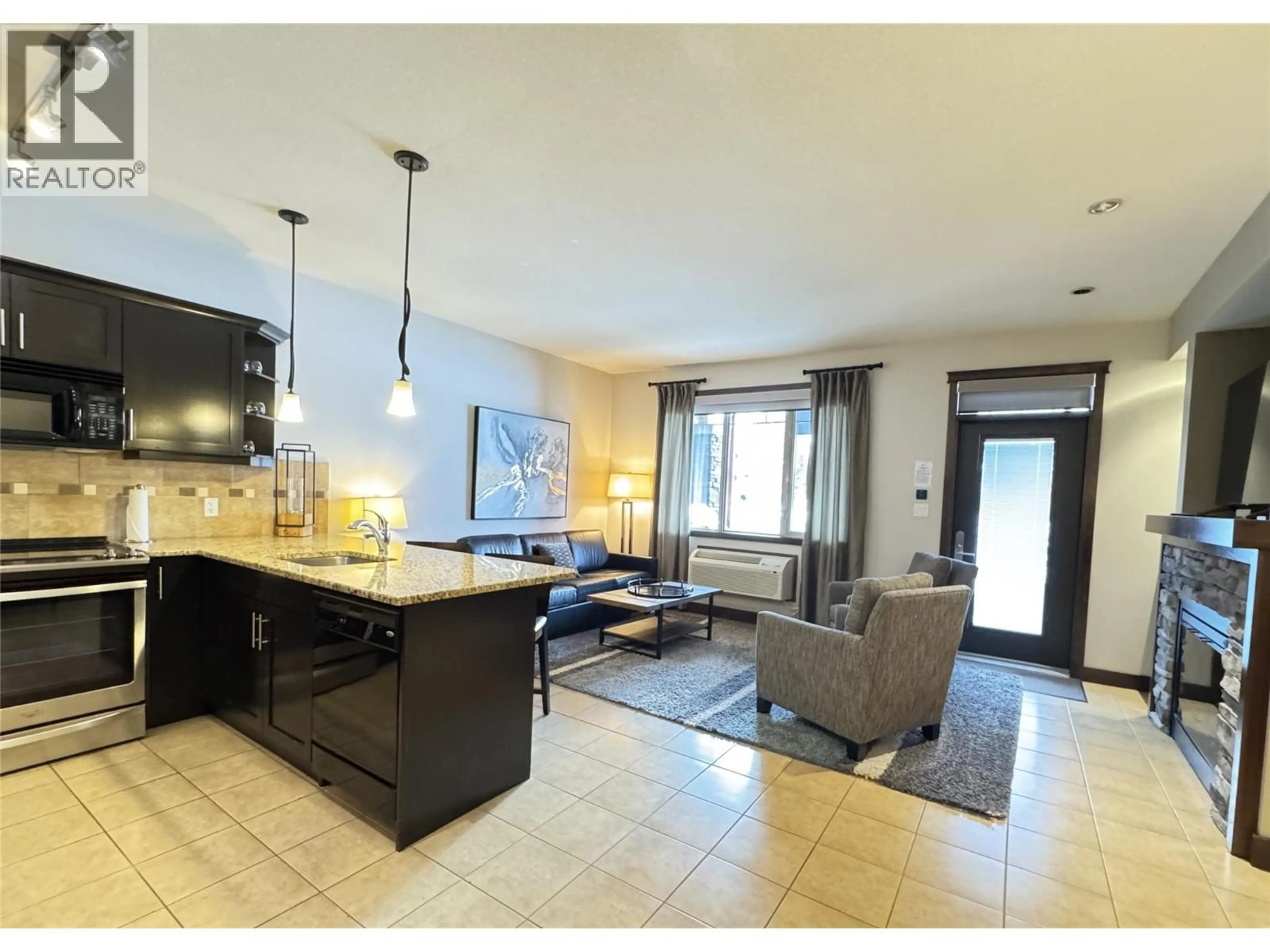 Open concept kitchen, ceramic/tile floor for 812F - 800 BIGHORN BOULEVARD, Radium Hot Springs British Columbia V0A1M0