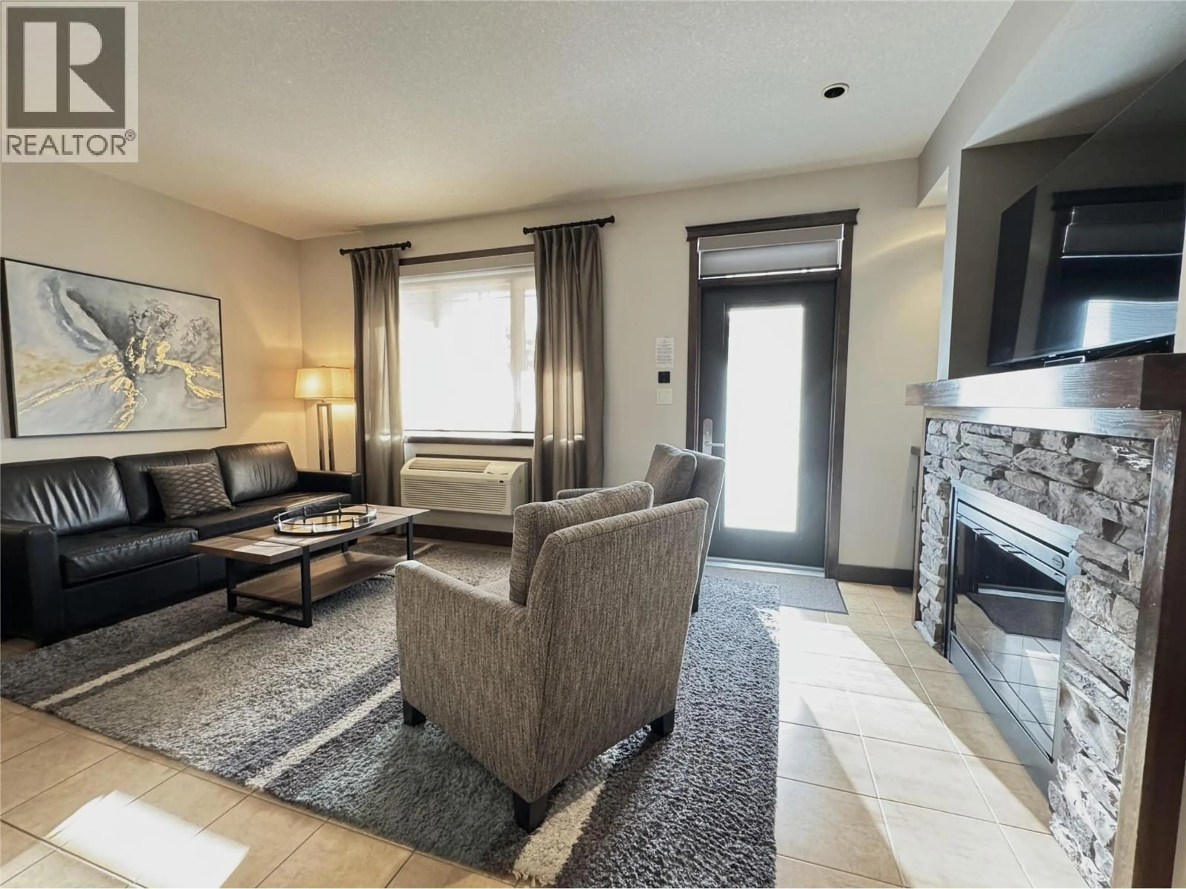 Living room with furniture, unknown for 812F - 800 BIGHORN BOULEVARD, Radium Hot Springs British Columbia V0A1M0