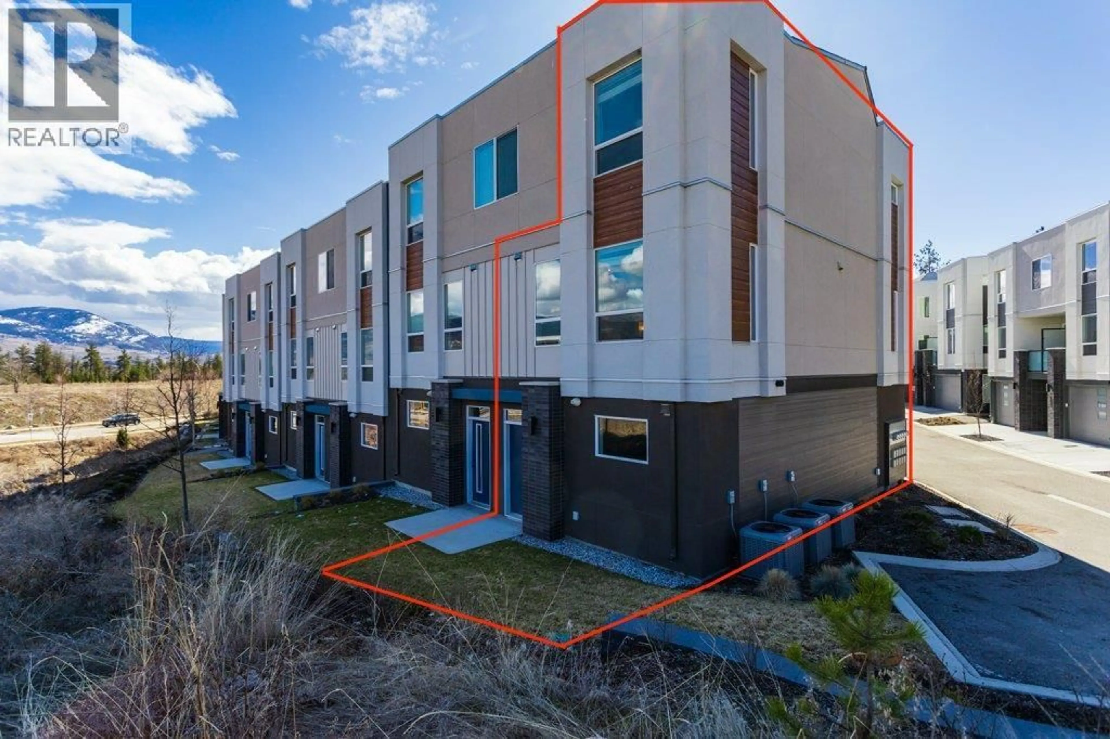 A pic from outside/outdoor area/front of a property/back of a property/a pic from drone, building for 42 - 610 ACADEMY WAY, Kelowna British Columbia V1V0H2