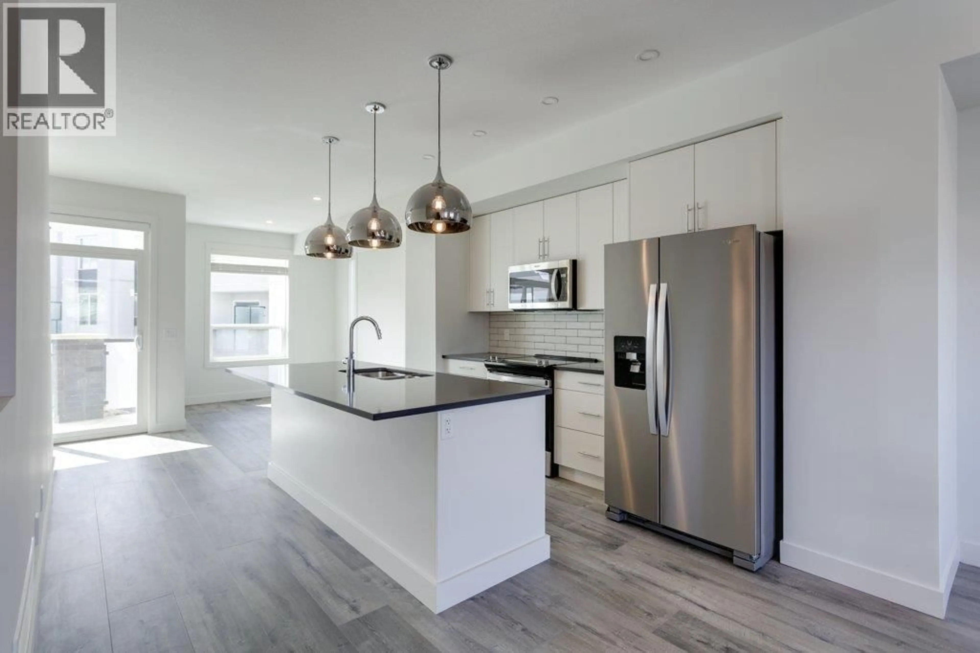 Open concept kitchen, unknown for 42 - 610 ACADEMY WAY, Kelowna British Columbia V1V0H2