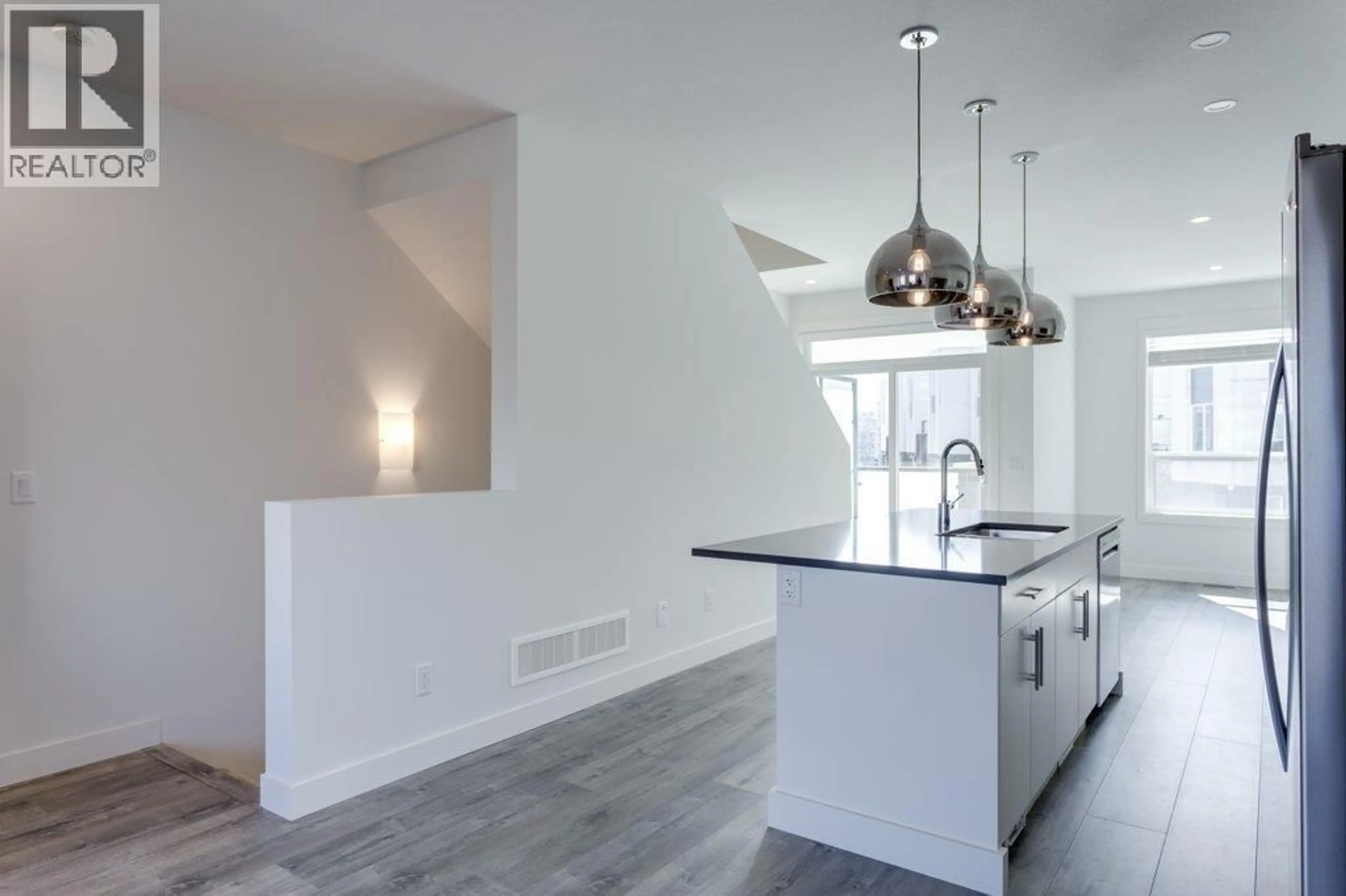 Open concept kitchen, unknown for 42 - 610 ACADEMY WAY, Kelowna British Columbia V1V0H2