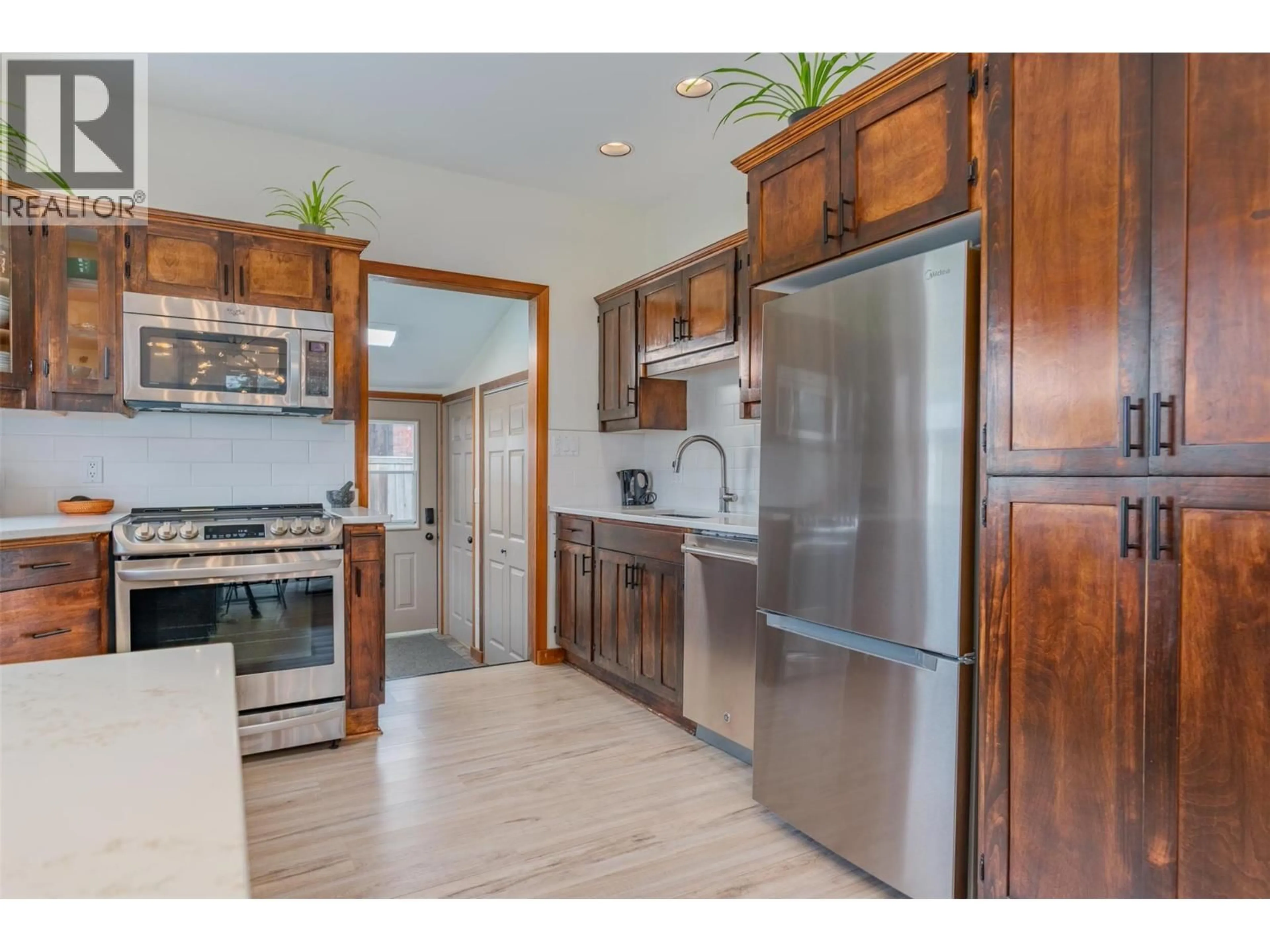 Open concept kitchen, ceramic/tile floor for 1938 SECOND AVENUE, Rossland British Columbia V0G1Y0