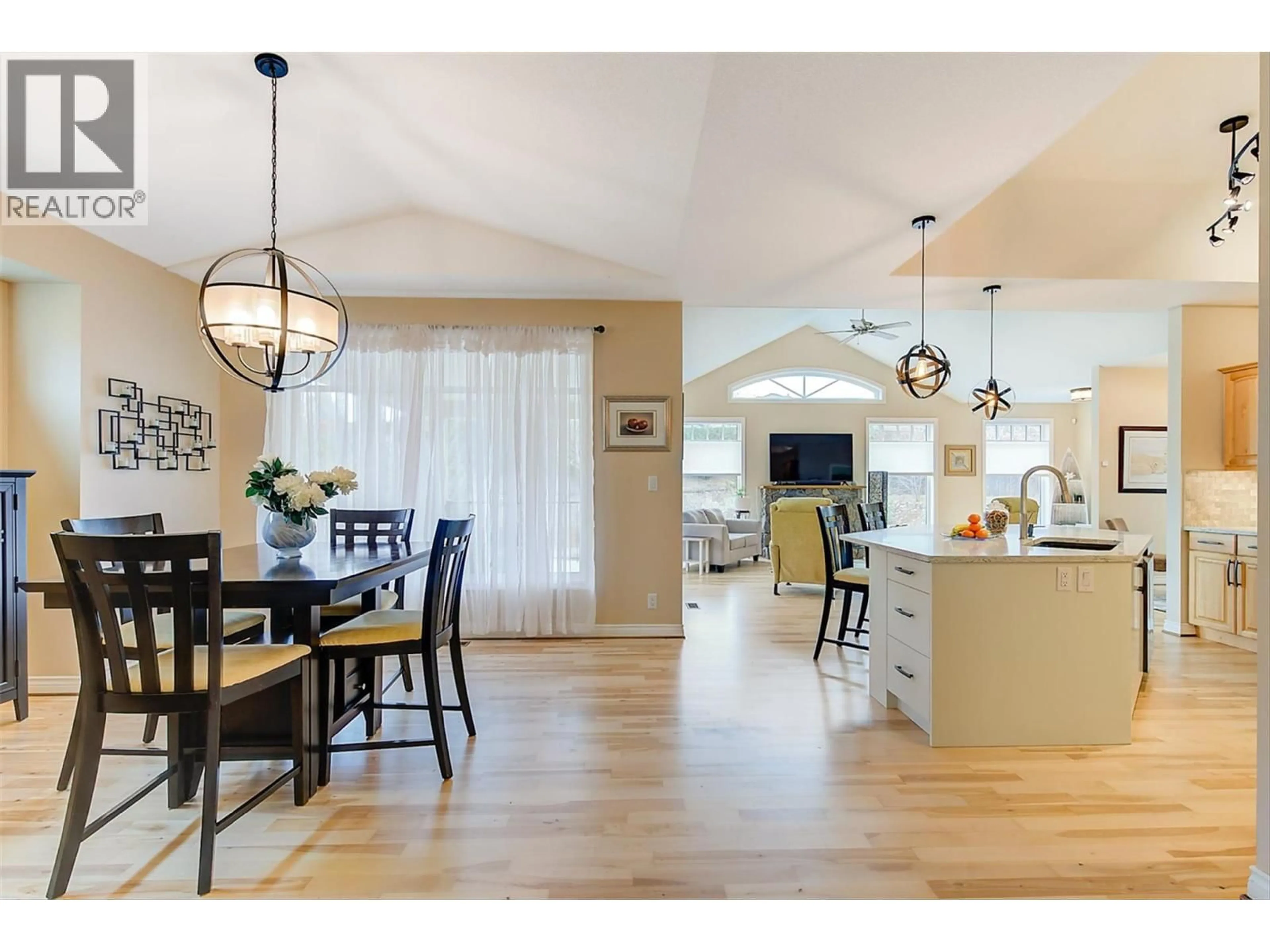 Open concept kitchen, wood/laminate floor for 174 JEWELL PLACE, Summerland British Columbia V0H1Z4