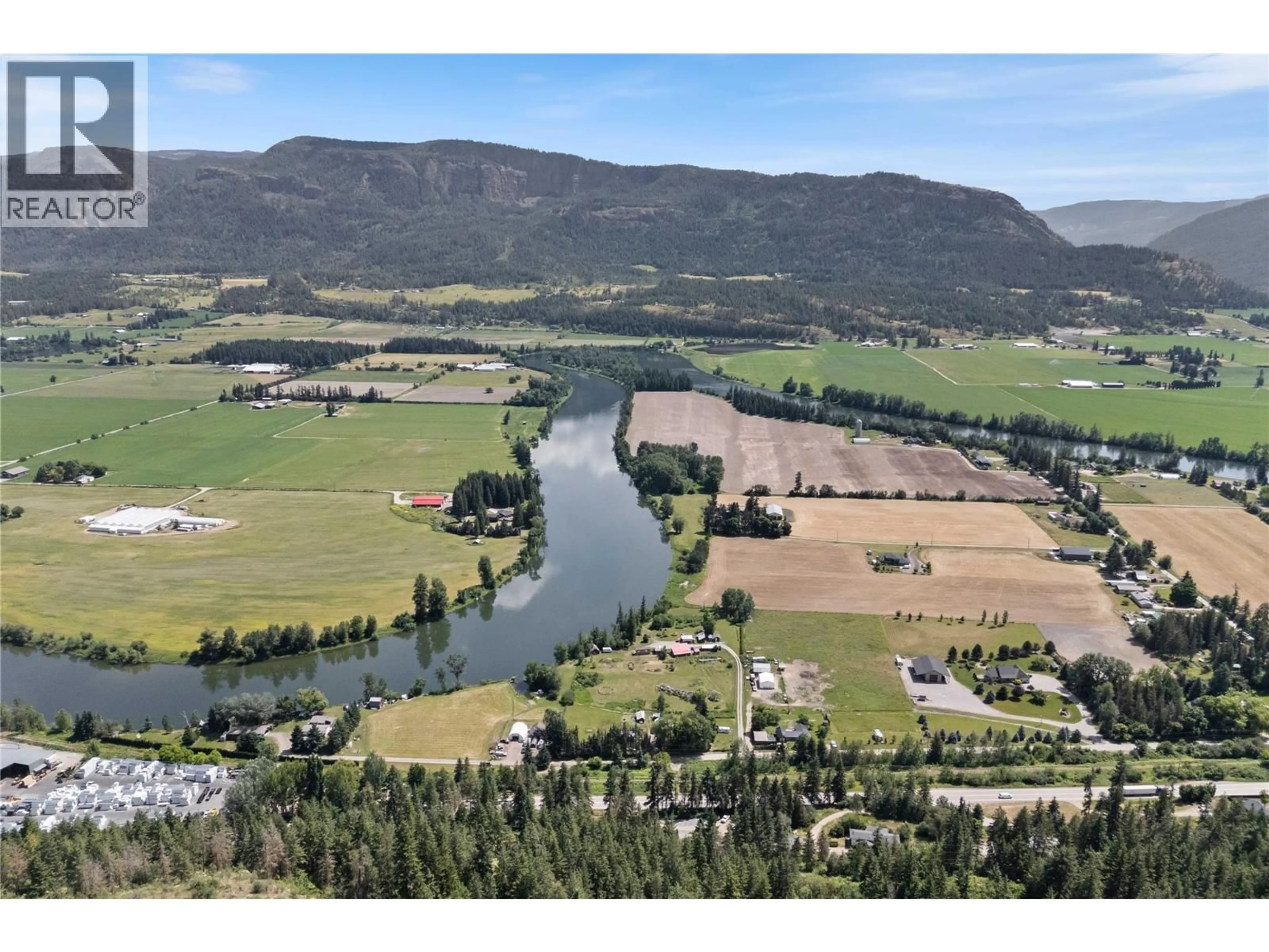 A pic from outside/outdoor area/front of a property/back of a property/a pic from drone, water/lake/river/ocean view for 6216 97A HIGHWAY, Enderby British Columbia V0E1V3