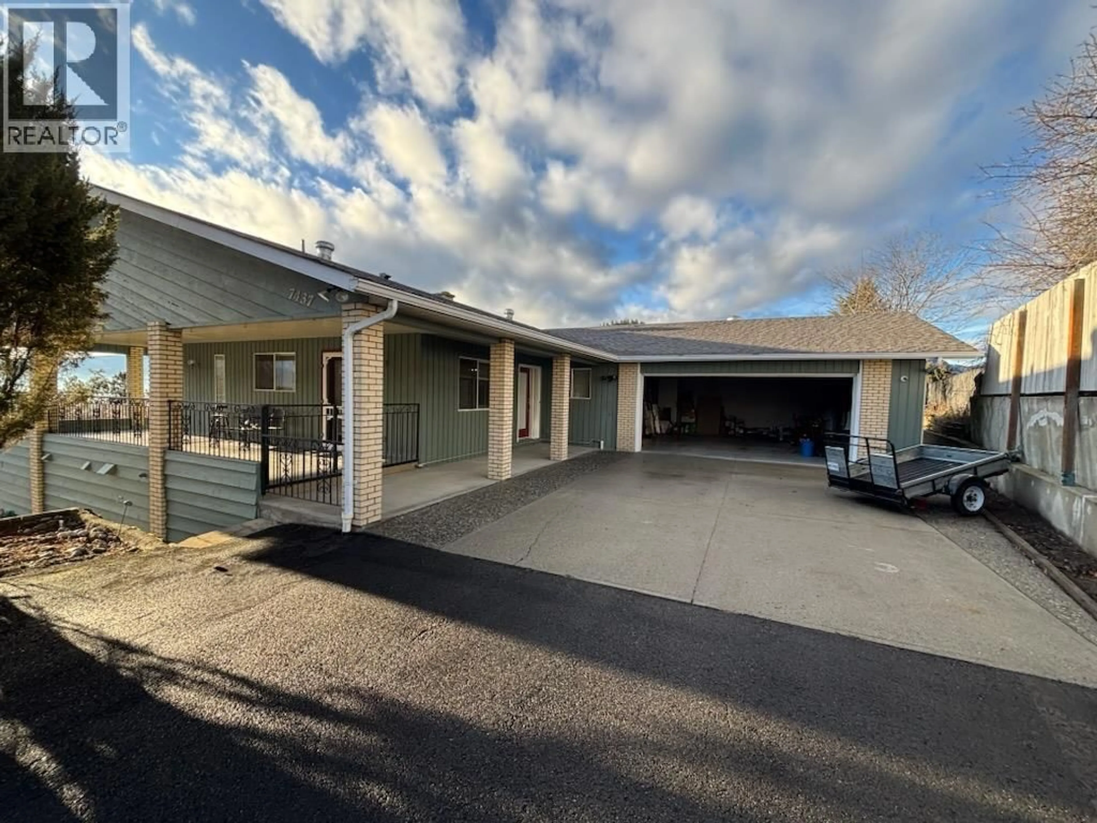 A pic from outside/outdoor area/front of a property/back of a property/a pic from drone, street for 7437 VALLEY HEIGHTS DRIVE, Grand Forks British Columbia V0H1H0