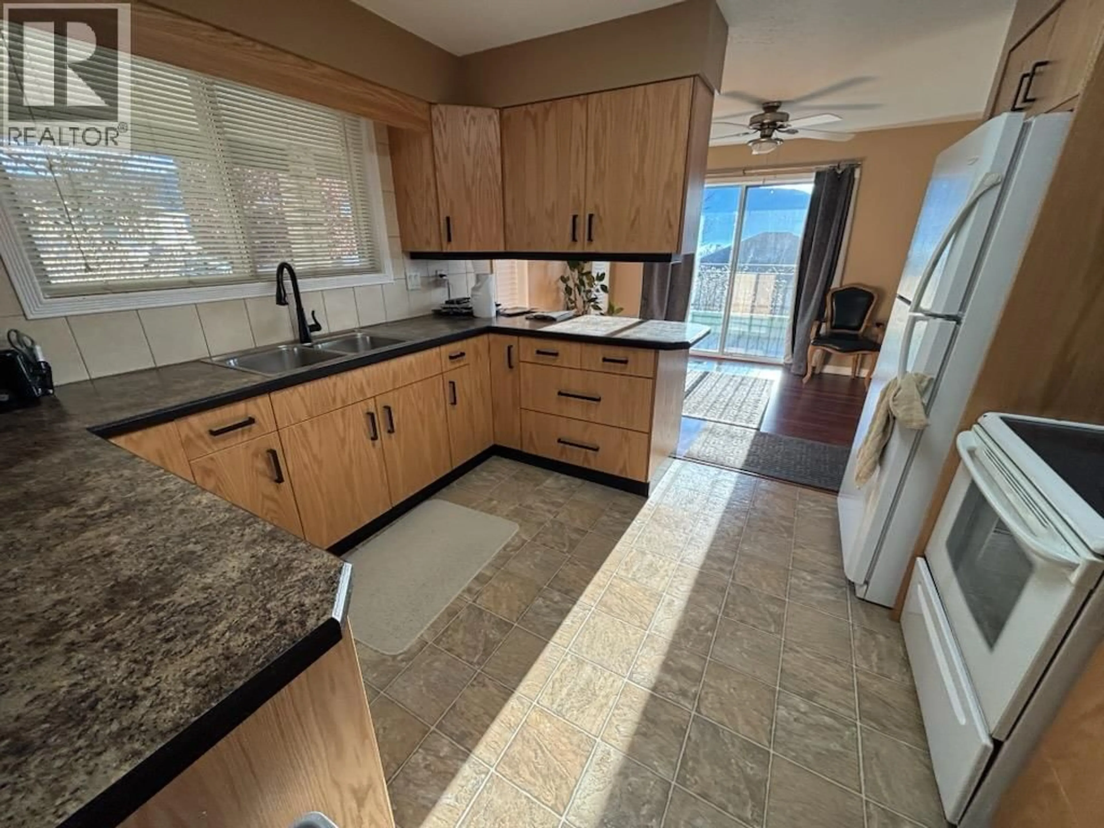 Standard kitchen, ceramic/tile floor for 7437 VALLEY HEIGHTS DRIVE, Grand Forks British Columbia V0H1H0