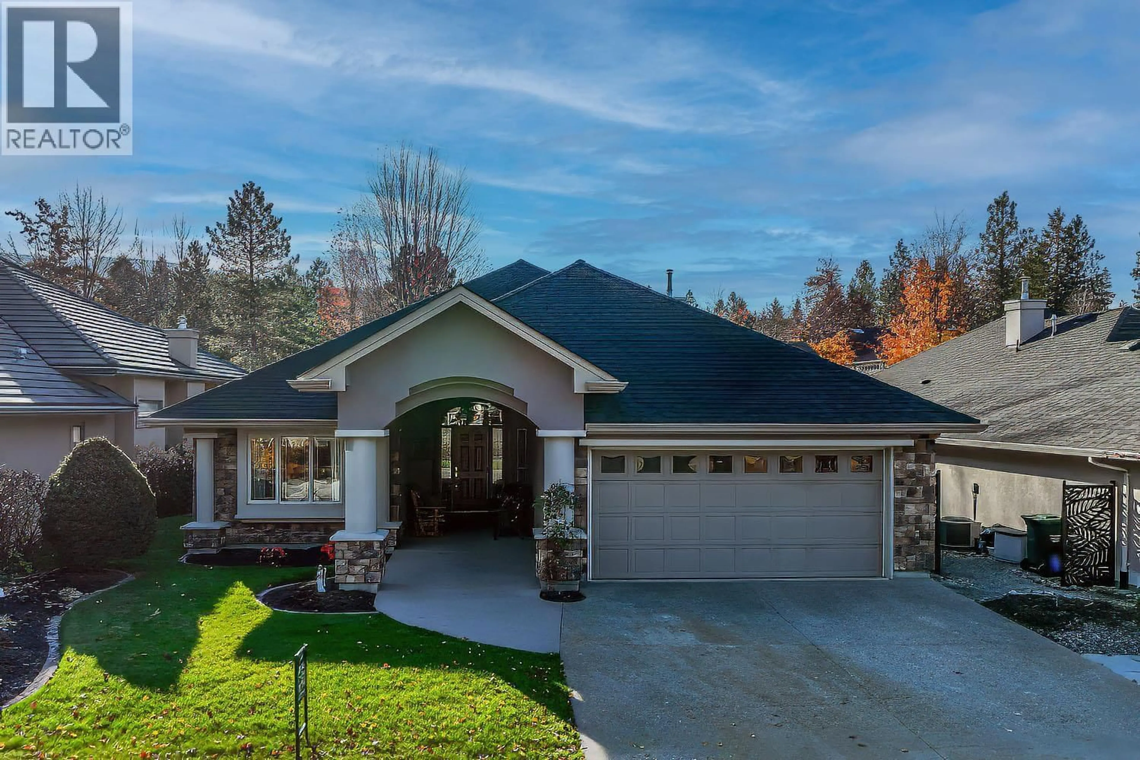 Home with brick exterior material, street for 4345 GALLAGHERS FAIRWAY SOUTH, Kelowna British Columbia V1W4X4