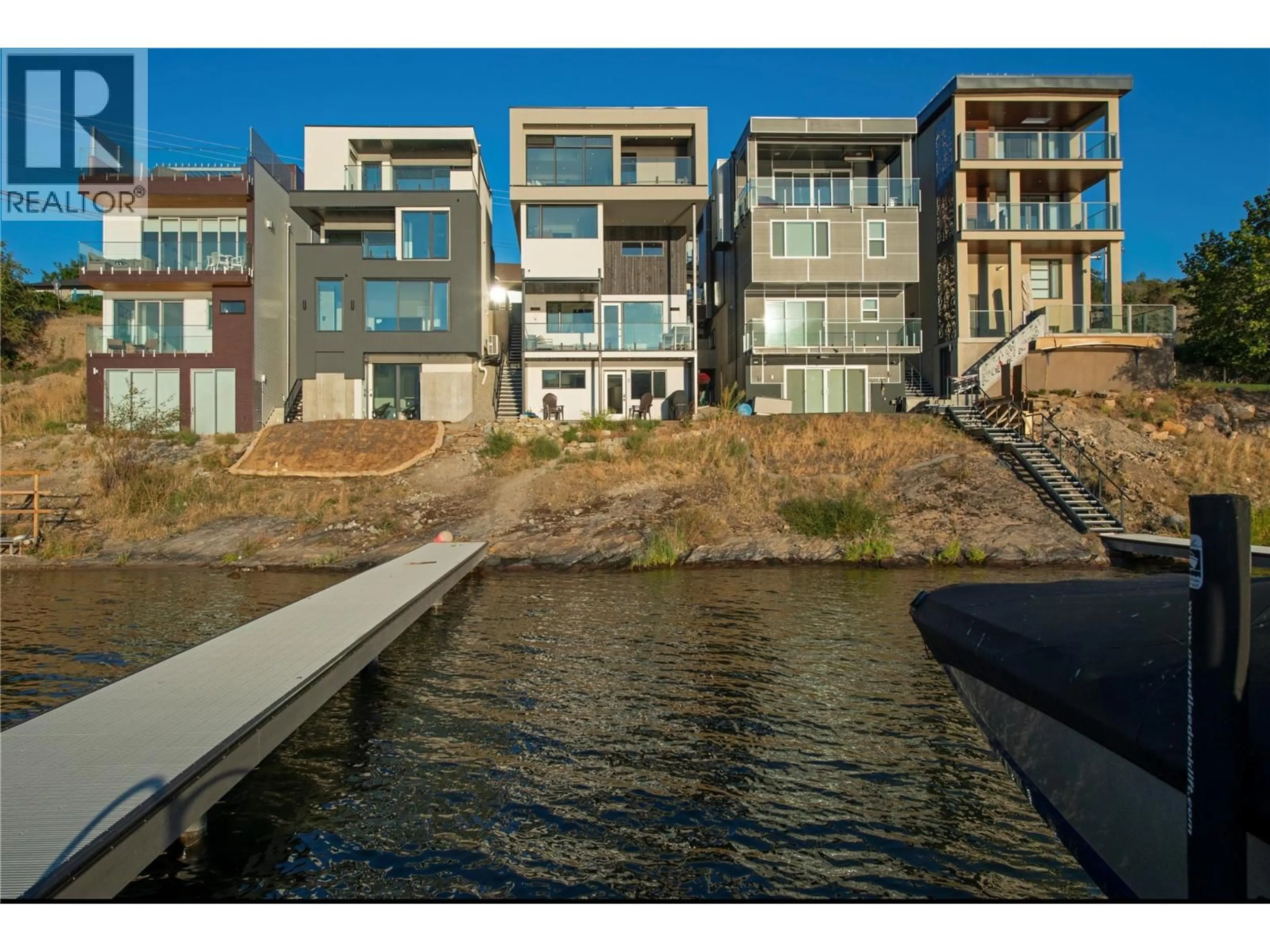 A pic from outside/outdoor area/front of a property/back of a property/a pic from drone, water/lake/river/ocean view for 4043 LAKESIDE ROAD, Penticton British Columbia V2A8W3