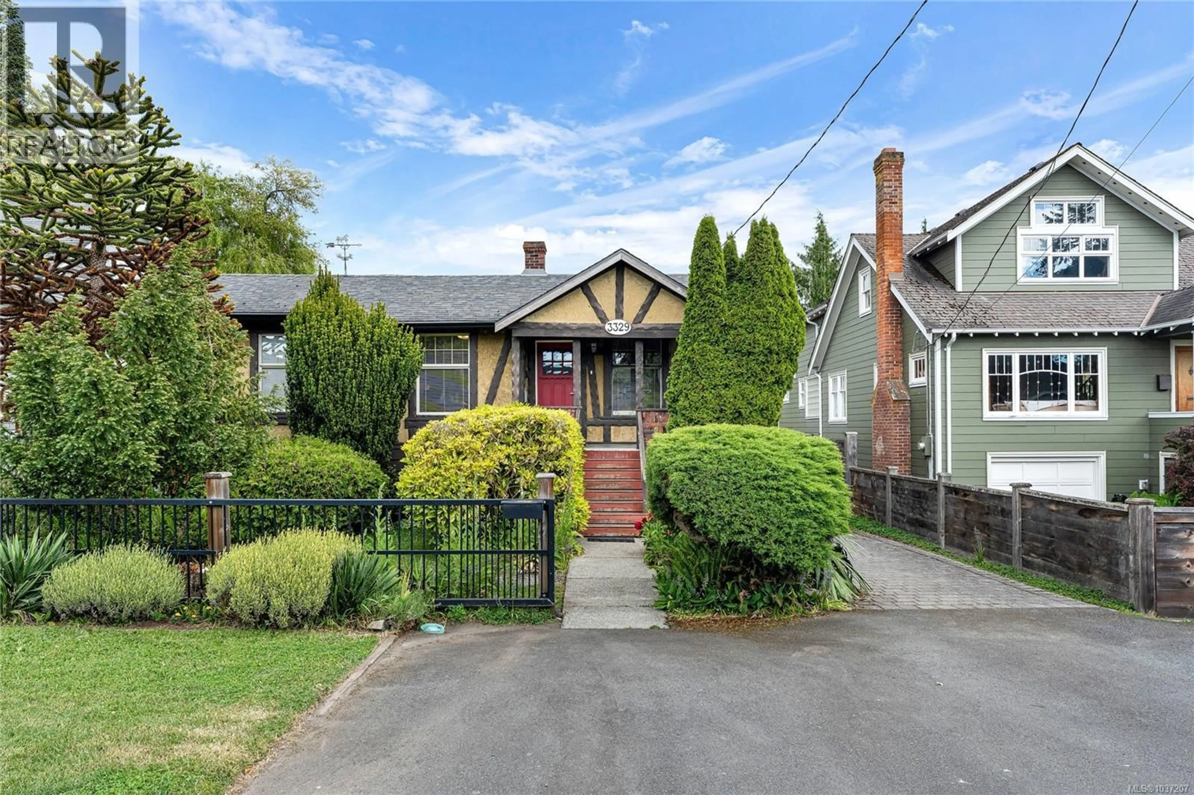 Home with brick exterior material, street for 3329 DONCASTER DRIVE, Saanich British Columbia V8P3V7