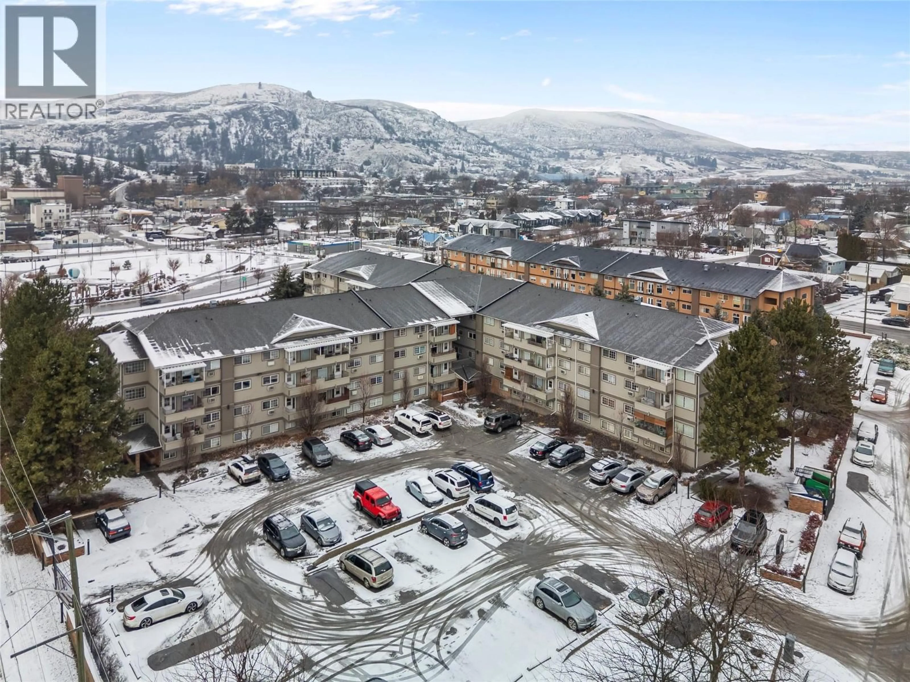 A pic from outside/outdoor area/front of a property/back of a property/a pic from drone, mountain view for 312 - 3700 28A STREET, Vernon British Columbia V1T9K6