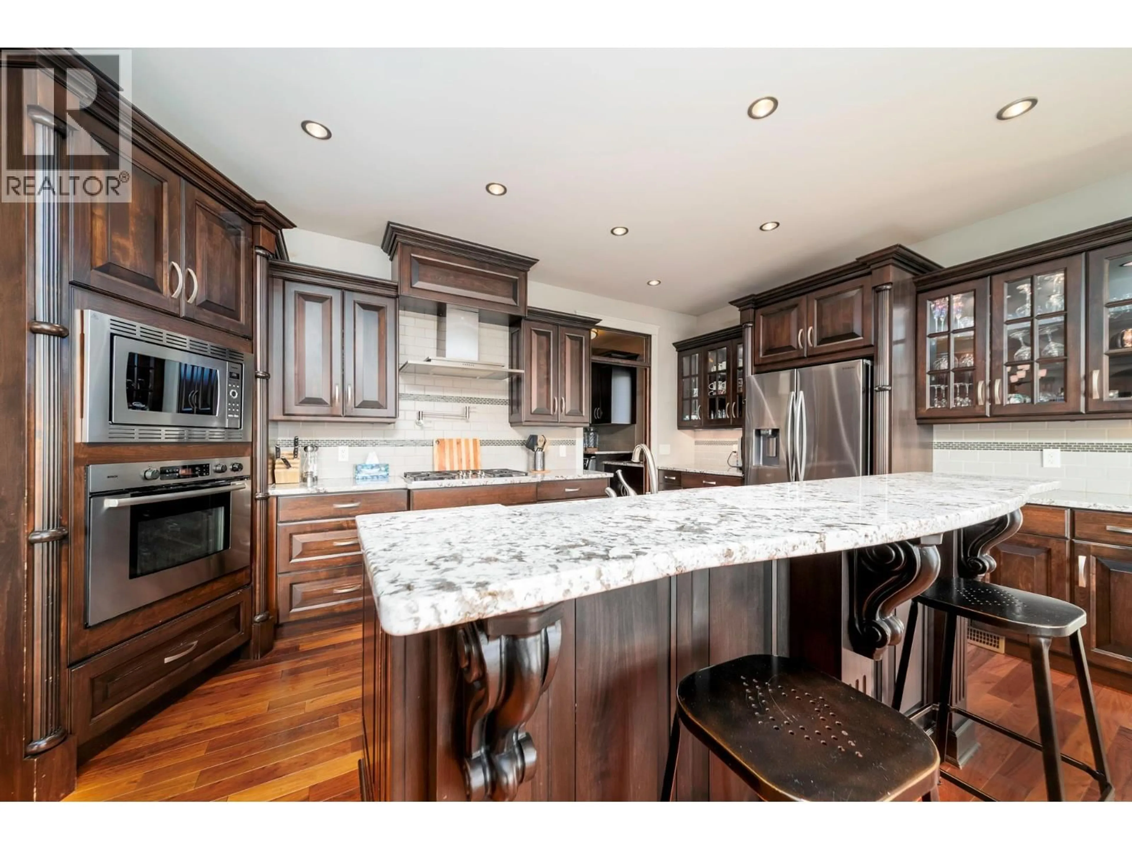 Open concept kitchen, wood/laminate floor for 3317 HIHANNAH VIEW, West Kelowna British Columbia V4T3C9