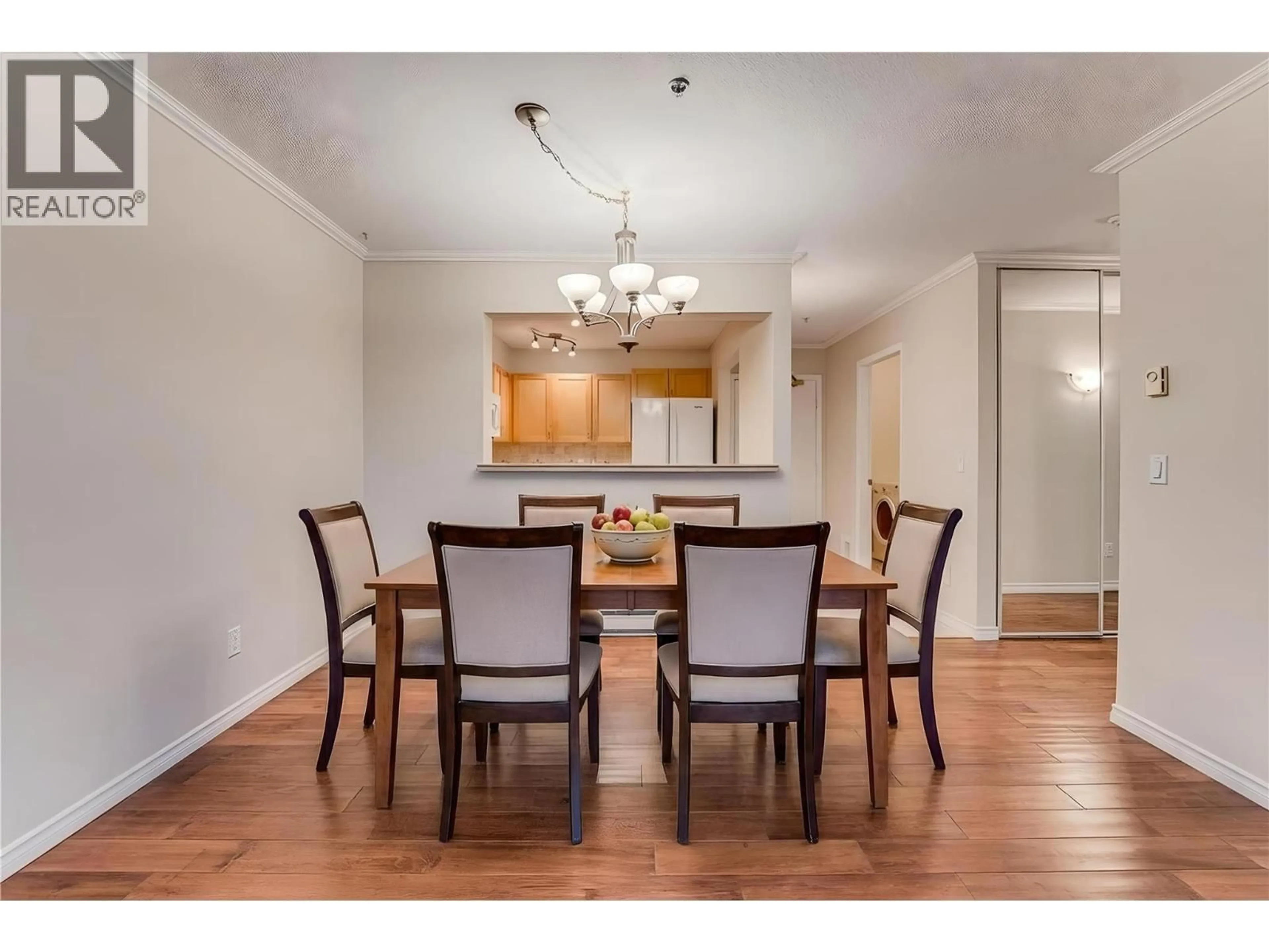 Dining room, wood/laminate floor for 102 - 3320 CENTENNIAL DRIVE, Vernon British Columbia V1T9M4