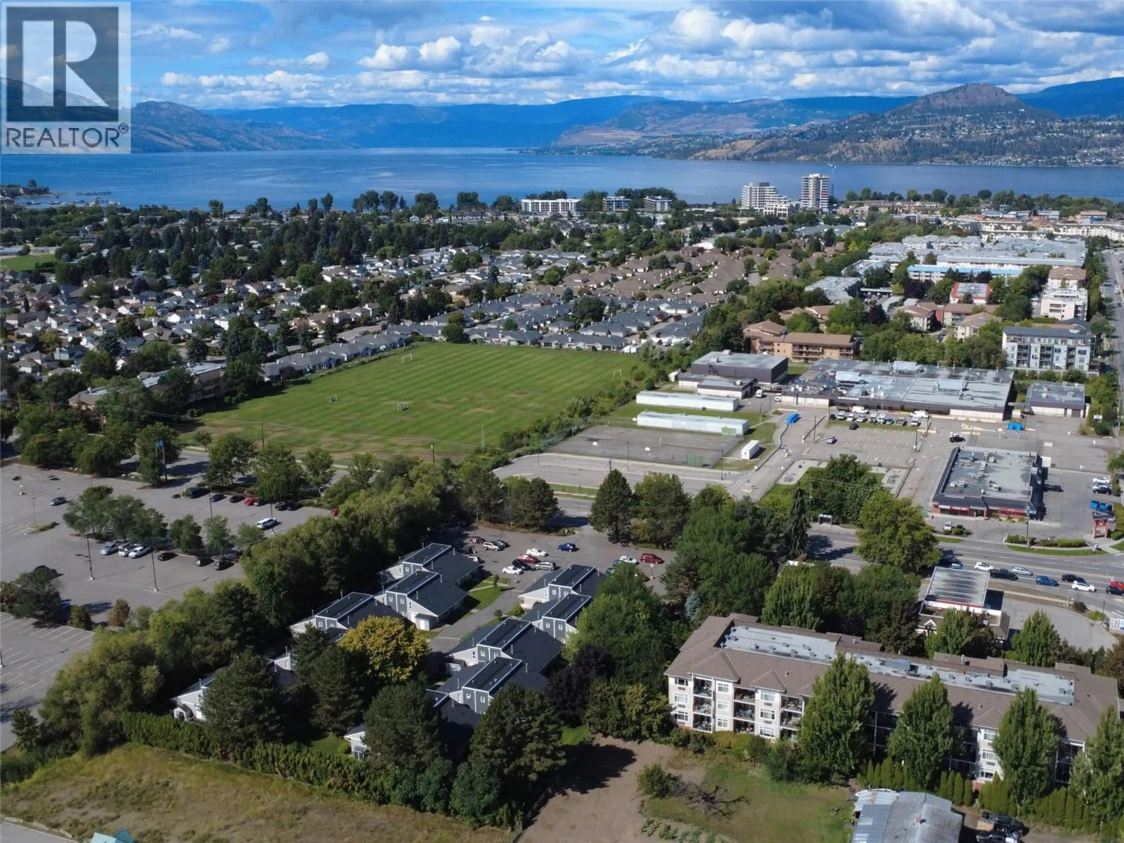 A pic from outside/outdoor area/front of a property/back of a property/a pic from drone, mountain view for 304 - 3155 GORDON DRIVE, Kelowna British Columbia V1W3N6
