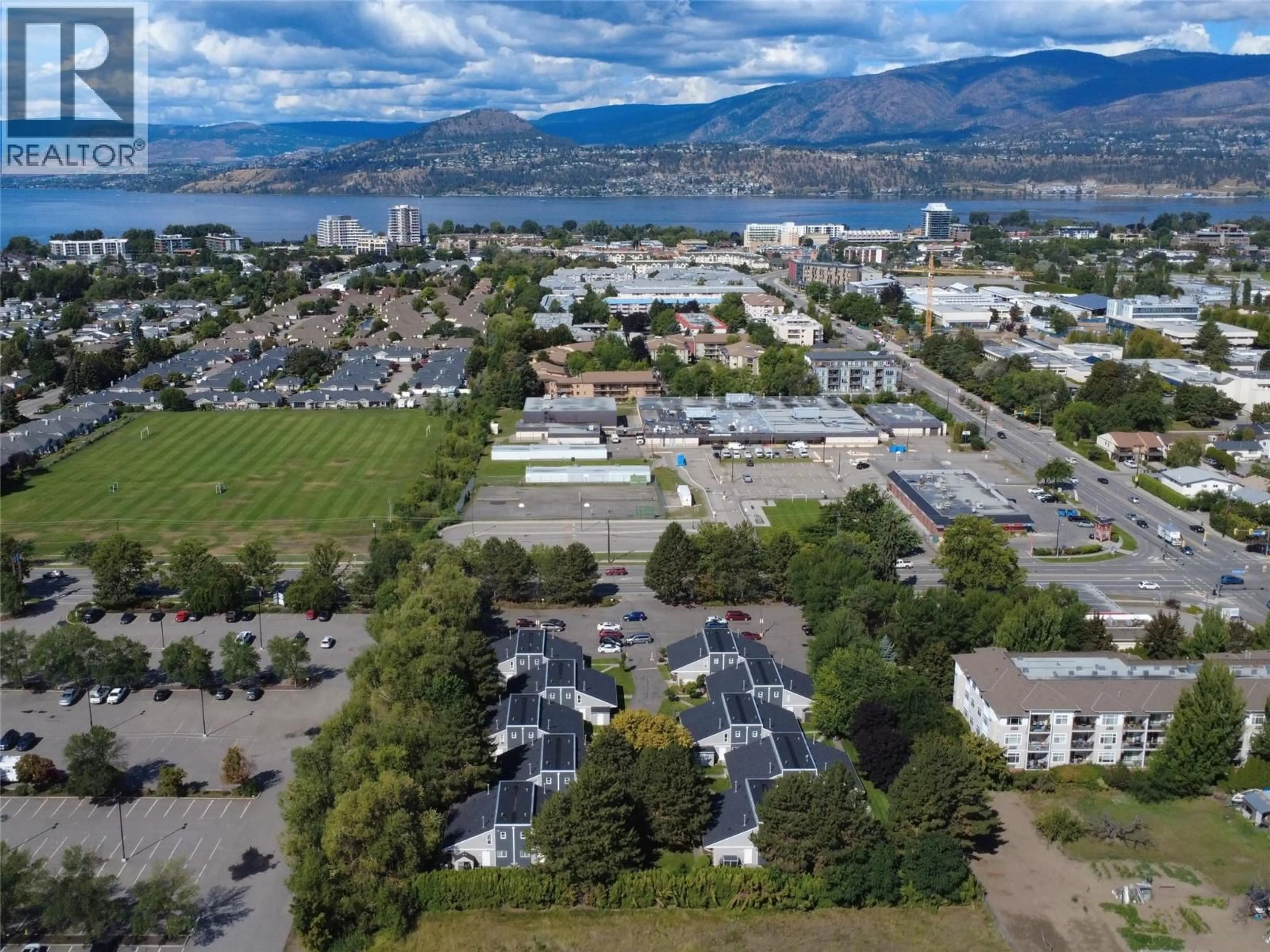 A pic from outside/outdoor area/front of a property/back of a property/a pic from drone, mountain view for 304 - 3155 GORDON DRIVE, Kelowna British Columbia V1W3N6