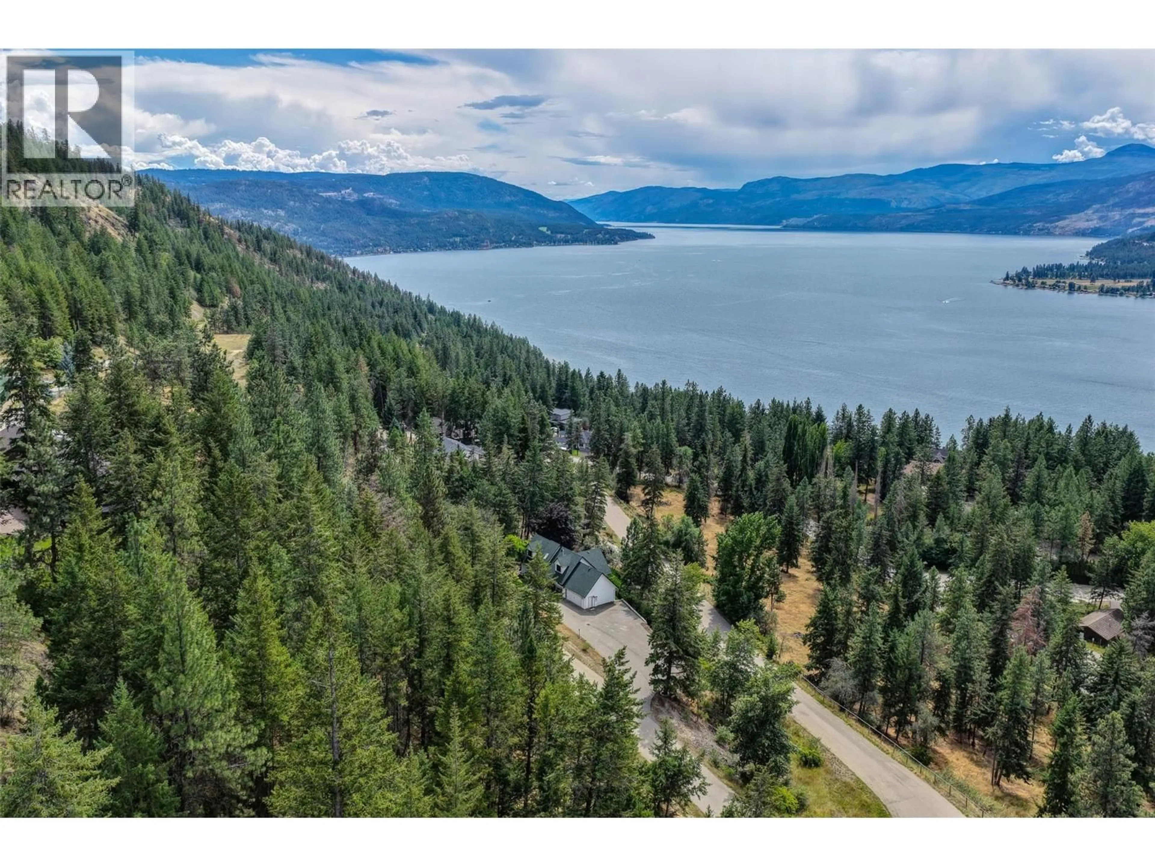 A pic from outside/outdoor area/front of a property/back of a property/a pic from drone, water/lake/river/ocean view for 133 GOLDCLAIM ROAD, Vernon British Columbia V1H1H2
