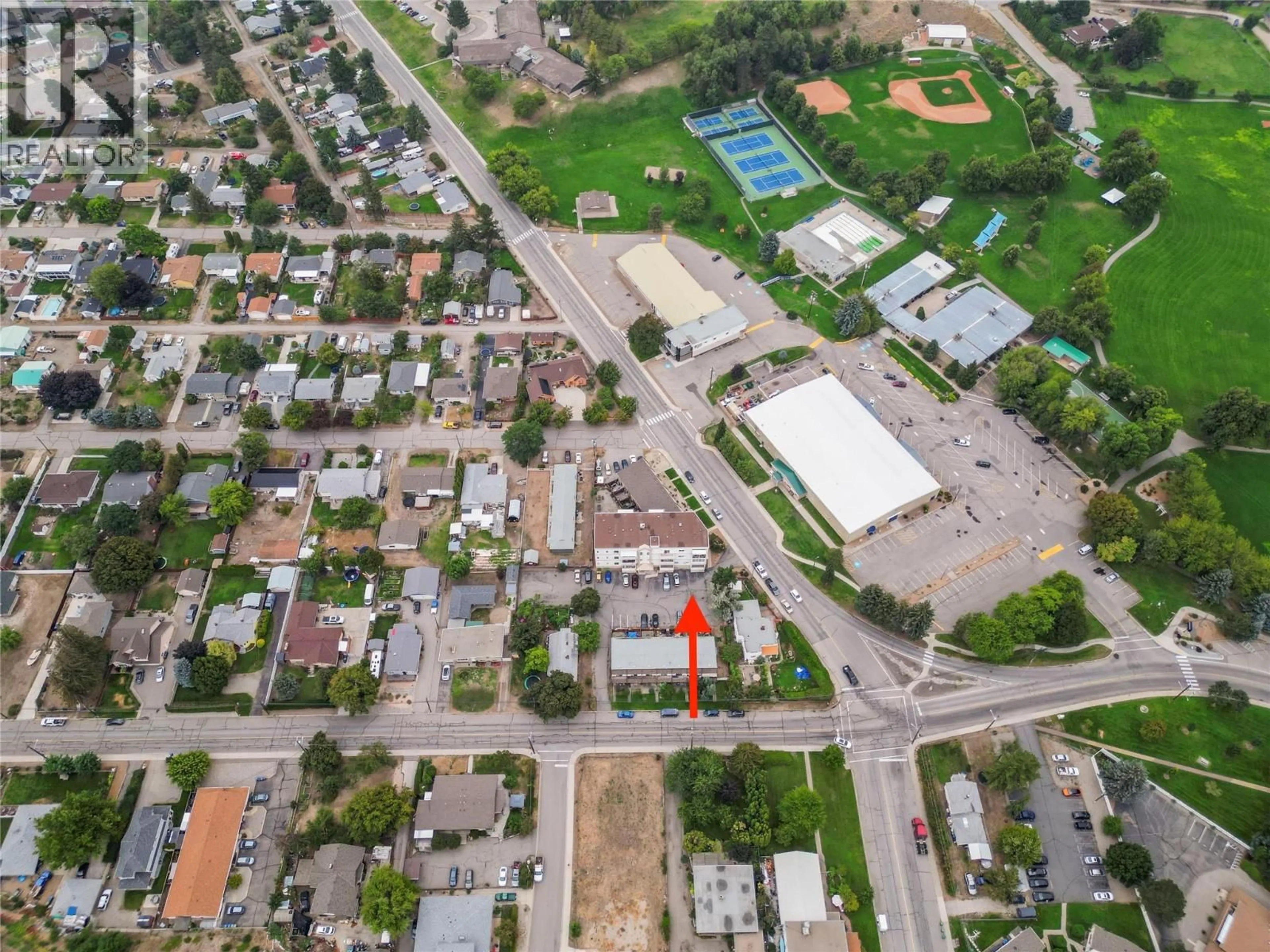 A pic from outside/outdoor area/front of a property/back of a property/a pic from drone, street for 114 - 650 MCKINNEY ROAD, Oliver British Columbia V0H1T3