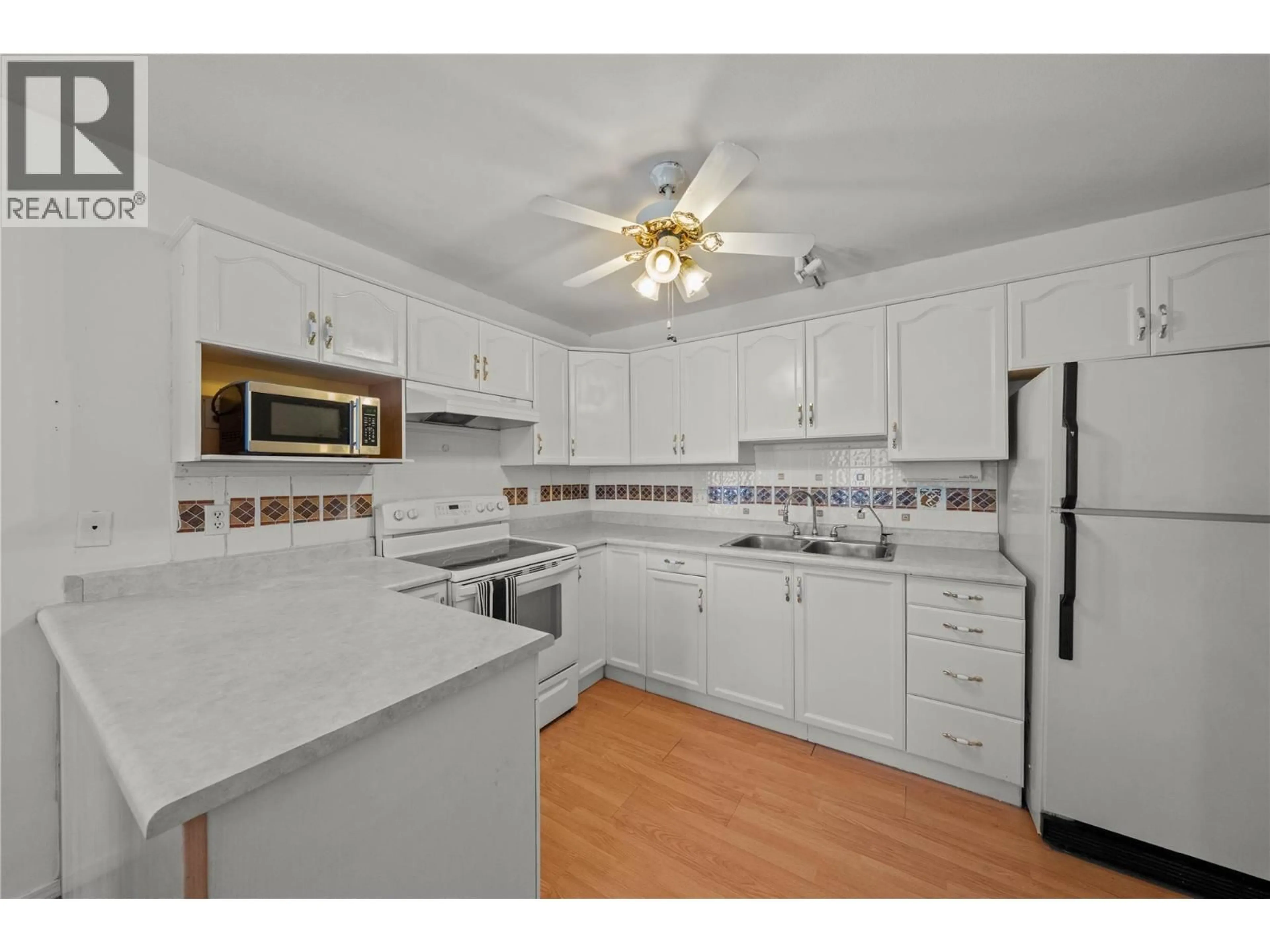 Standard kitchen, ceramic/tile floor for 114 - 650 MCKINNEY ROAD, Oliver British Columbia V0H1T3