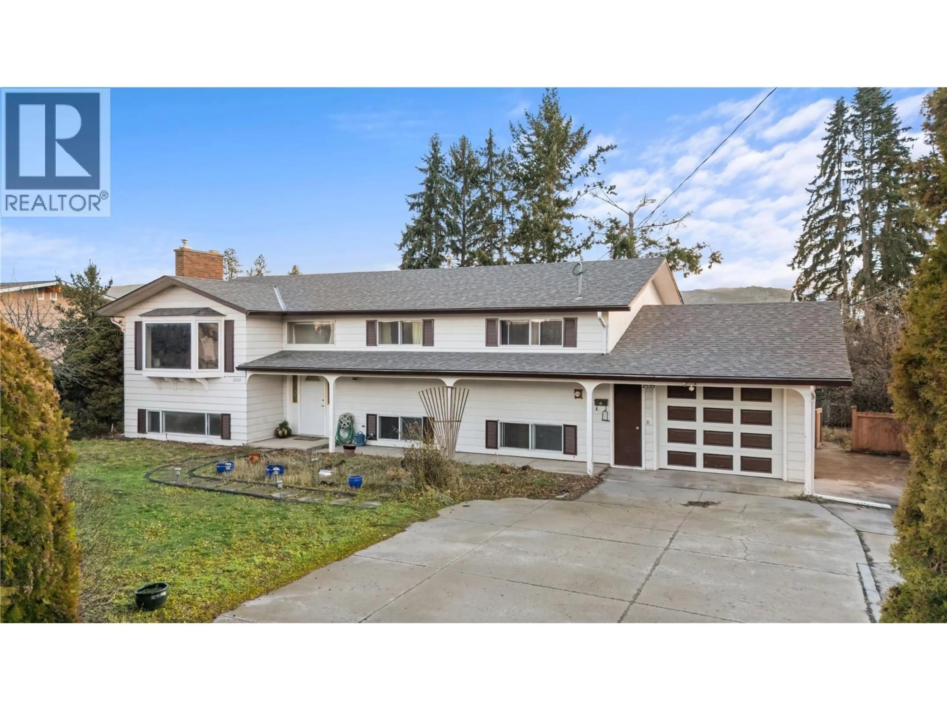 Home with vinyl exterior material, street for 2535 CRESTVIEW ROAD, West Kelowna British Columbia V1Z1Z4