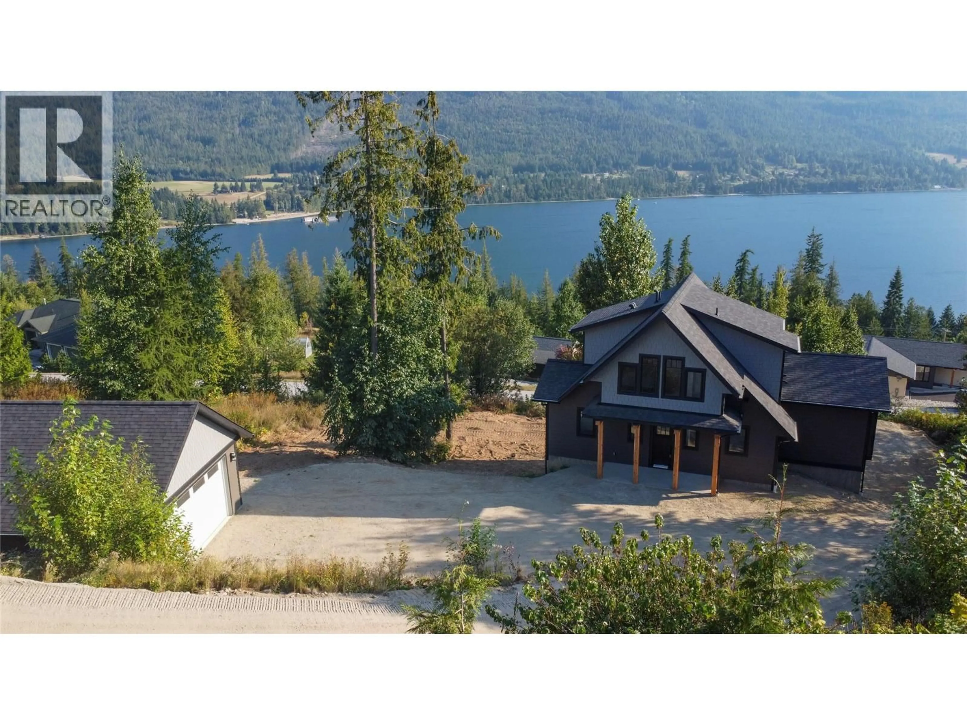 A pic from outside/outdoor area/front of a property/back of a property/a pic from drone, water/lake/river/ocean view for 145 LAKEVIEW DRIVE, Nelson British Columbia V1L6W6
