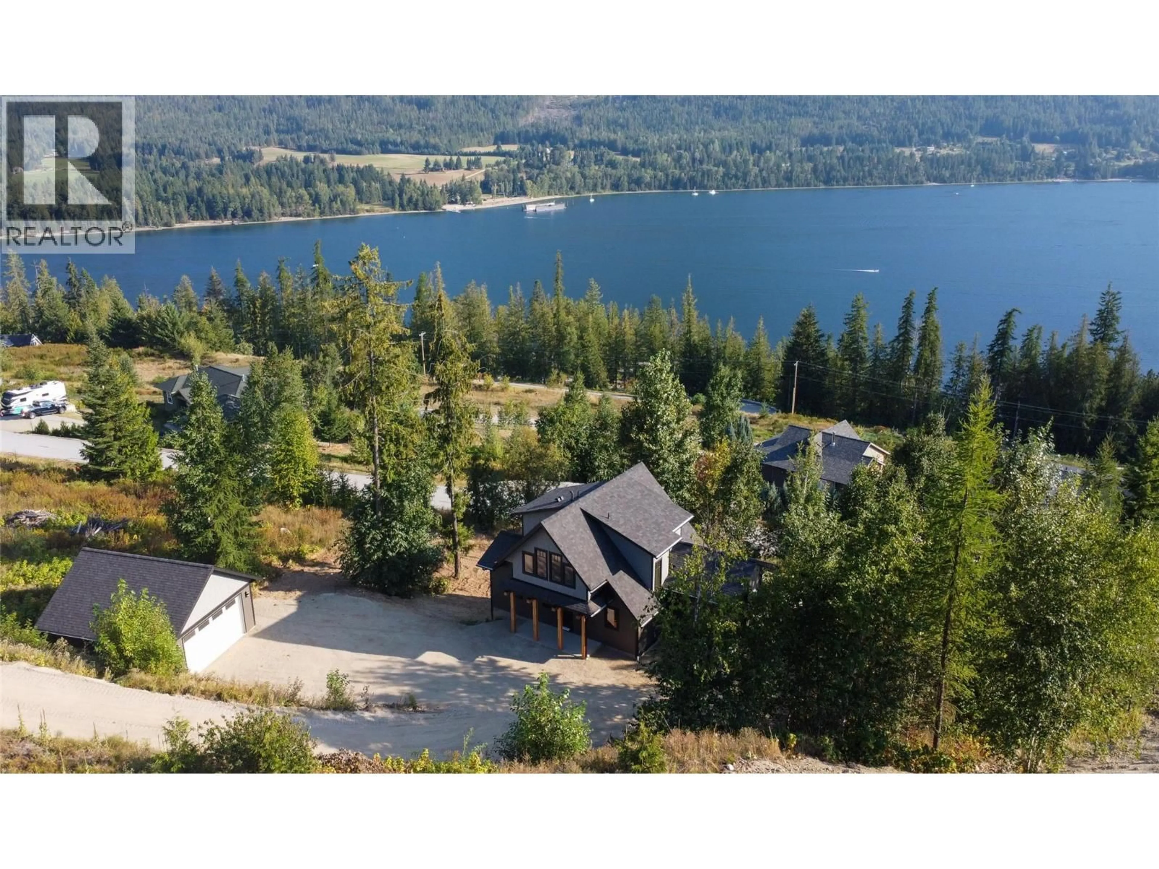 A pic from outside/outdoor area/front of a property/back of a property/a pic from drone, water/lake/river/ocean view for 145 LAKEVIEW DRIVE, Nelson British Columbia V1L6W6