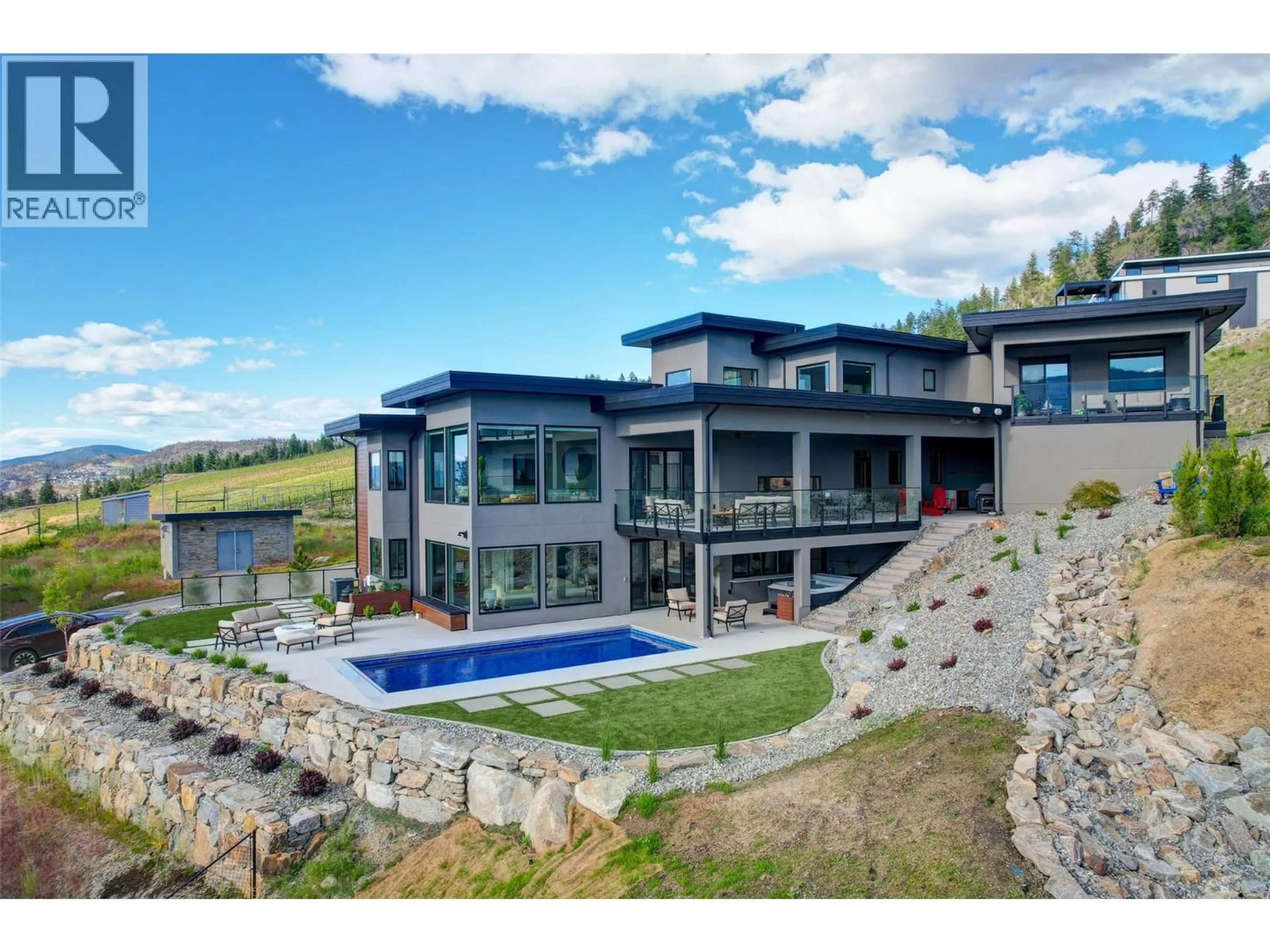 A pic from outside/outdoor area/front of a property/back of a property/a pic from drone, mountain view for 3645 MCKINLEY BEACH DRIVE, Kelowna British Columbia V1V3G2
