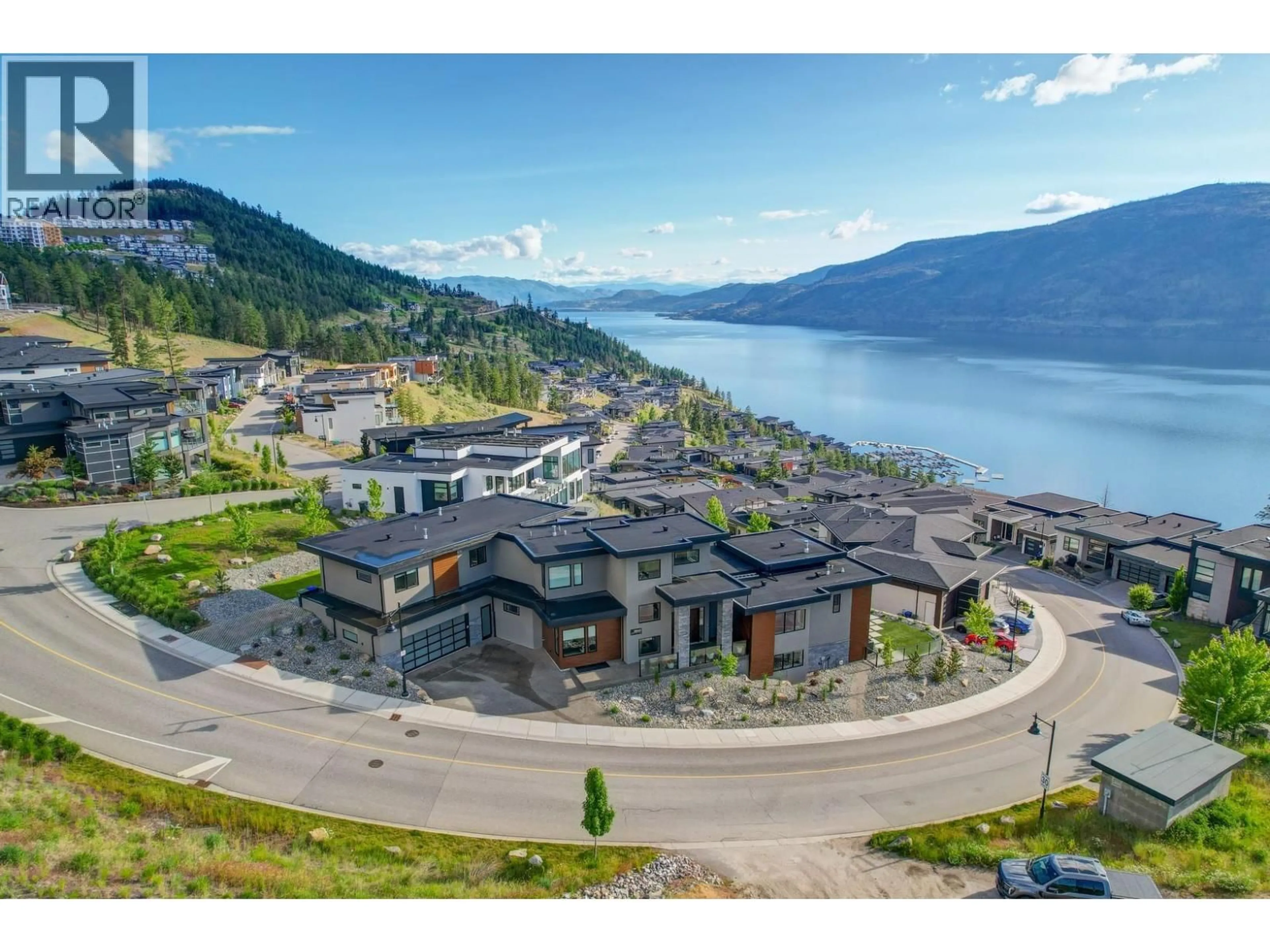 A pic from outside/outdoor area/front of a property/back of a property/a pic from drone, water/lake/river/ocean view for 3645 MCKINLEY BEACH DRIVE, Kelowna British Columbia V1V3G2